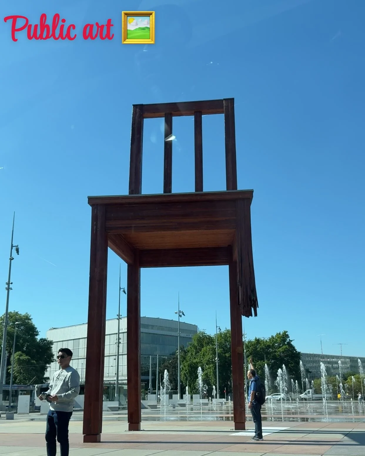 Broken chair symbolises opposition to land mines and cluster bombs. Stands near entrance to UN in Geneva: https://en.m.wikipedia.org/wiki/Broken_Chair