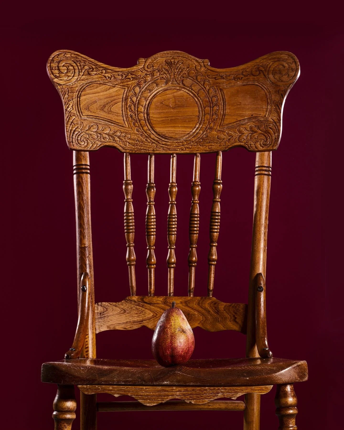 A Pear On A Chair