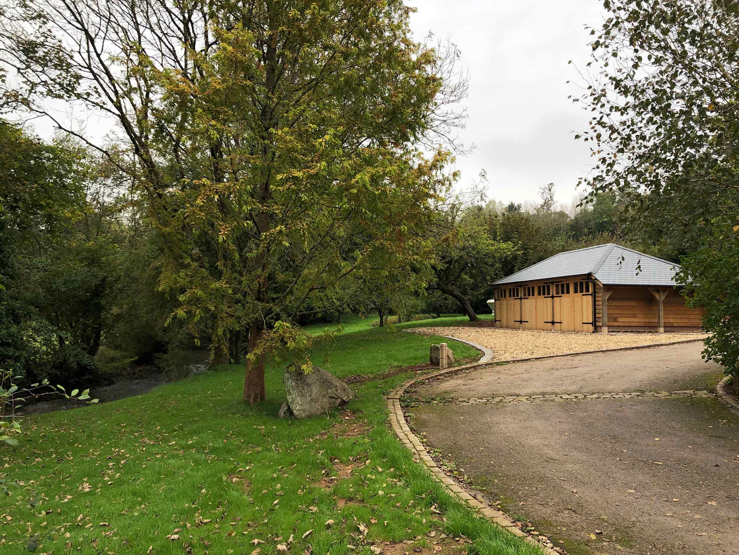 Timber-Framed Garage with Siberian Larch Cladding