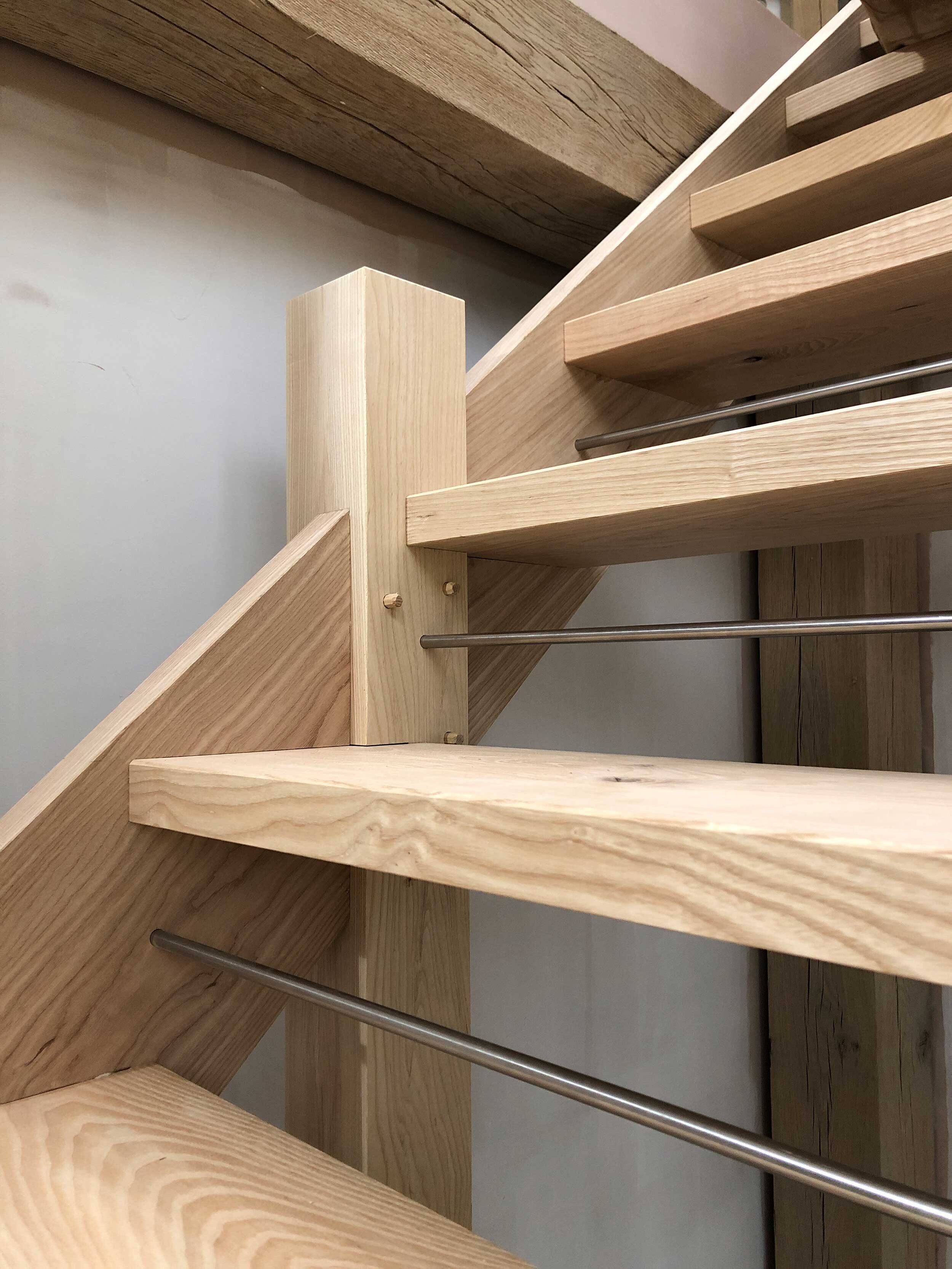 Contemporary pegged Ash and steel staircase
