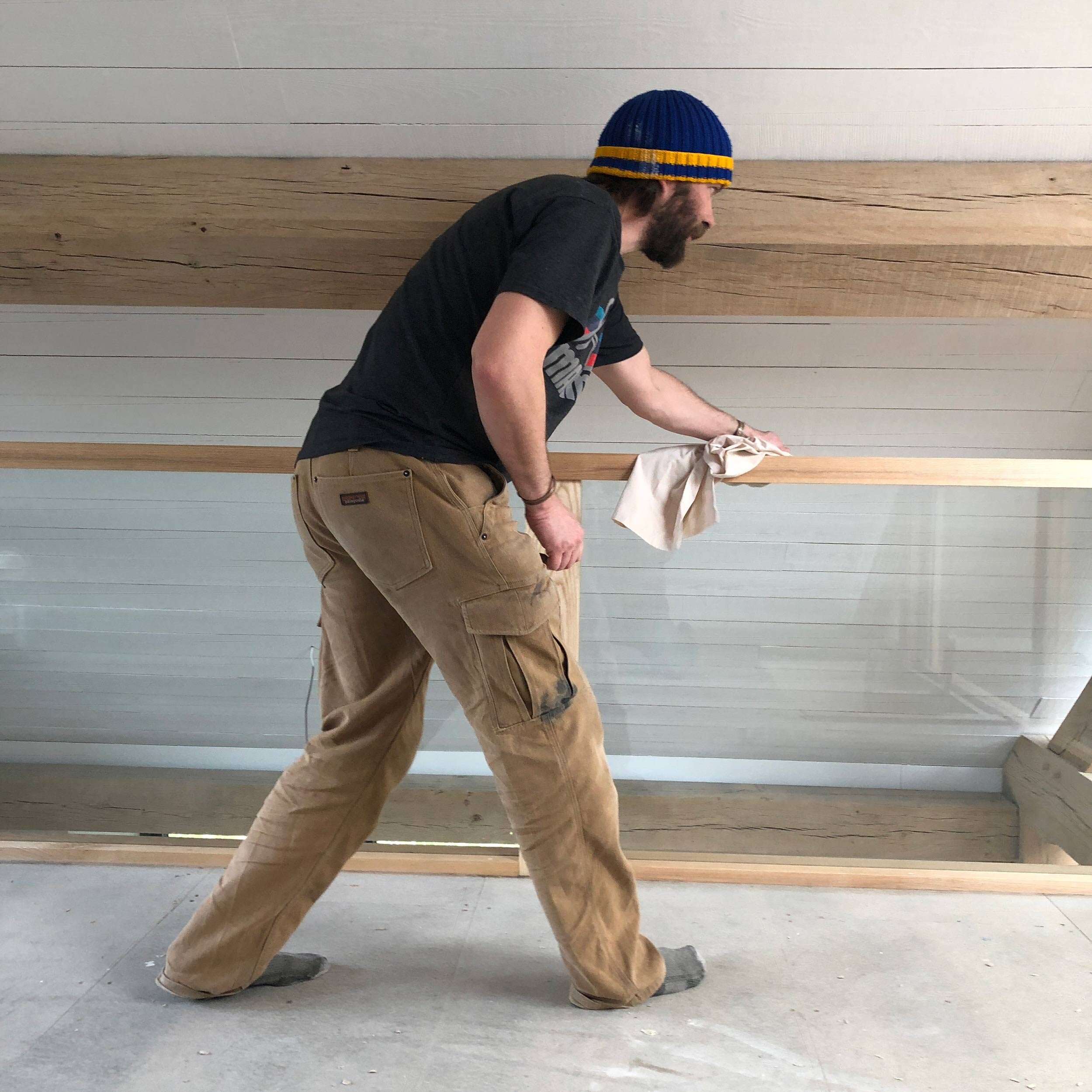 Carpenter Polishing Oak and glass balustrade