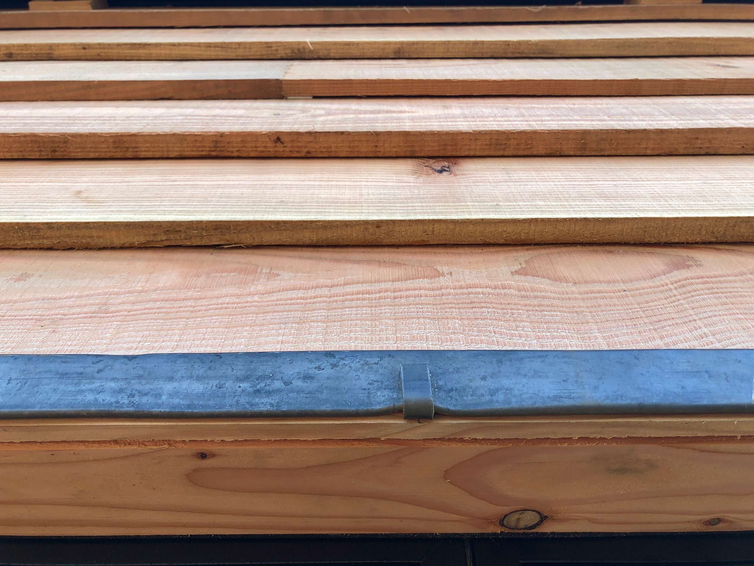 Lead flashing and drip detail in Larch cladding