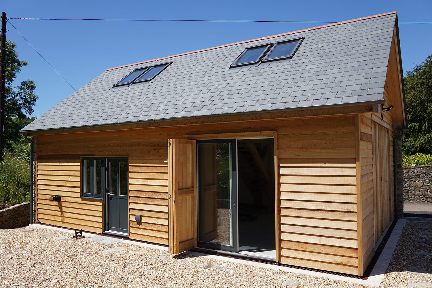 Timber graden building with timber bifold doors