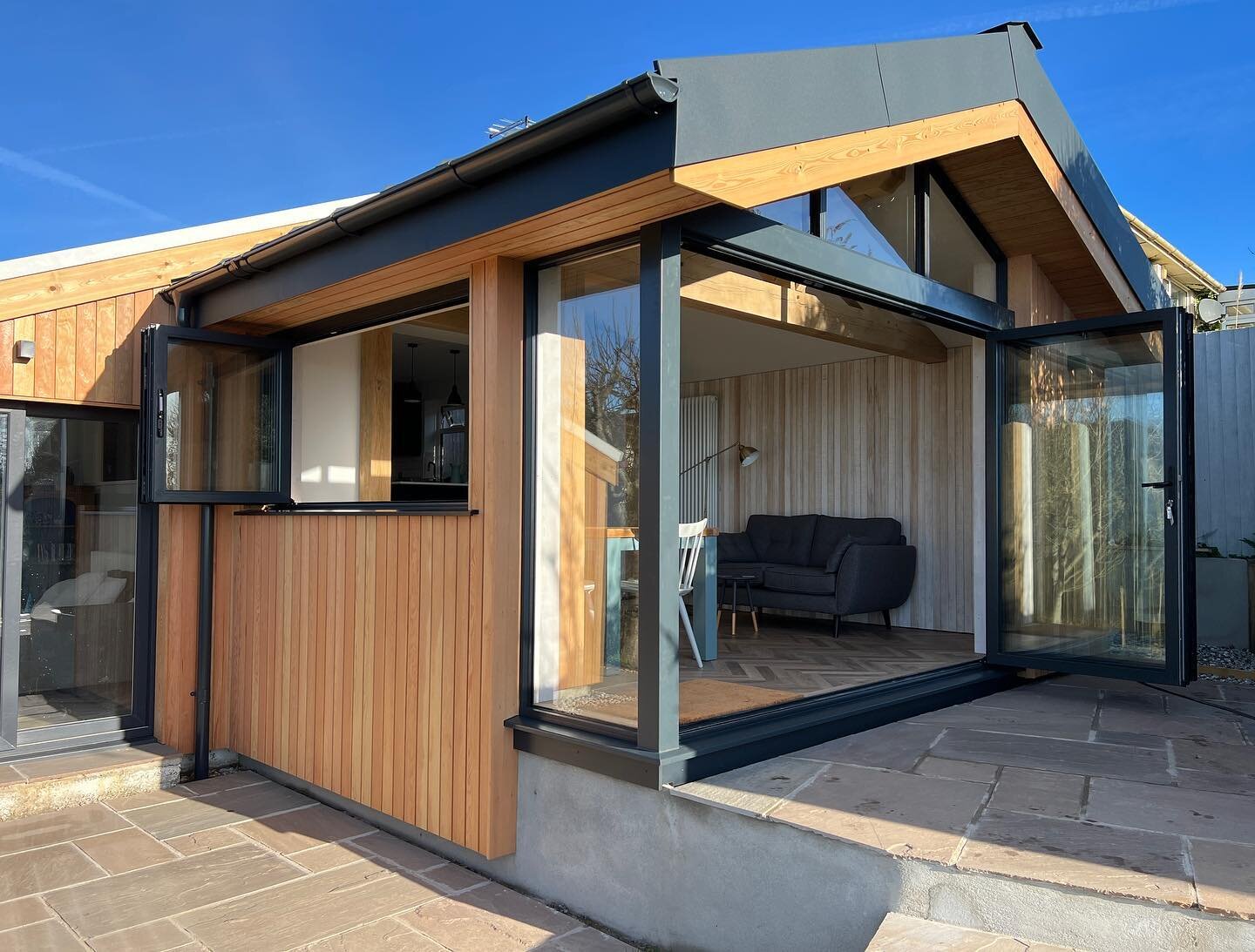 Wow what a day to finish - we were treated to a proper summers day out here on the coast. Glad we installed the bi-folds 😂😍 

#timberbuildingspecialists 
#timberbuildings 
#ecobuilding 
#naturalinsulation 
@backtoearth.sw
#aluminiumroof
#timberclad