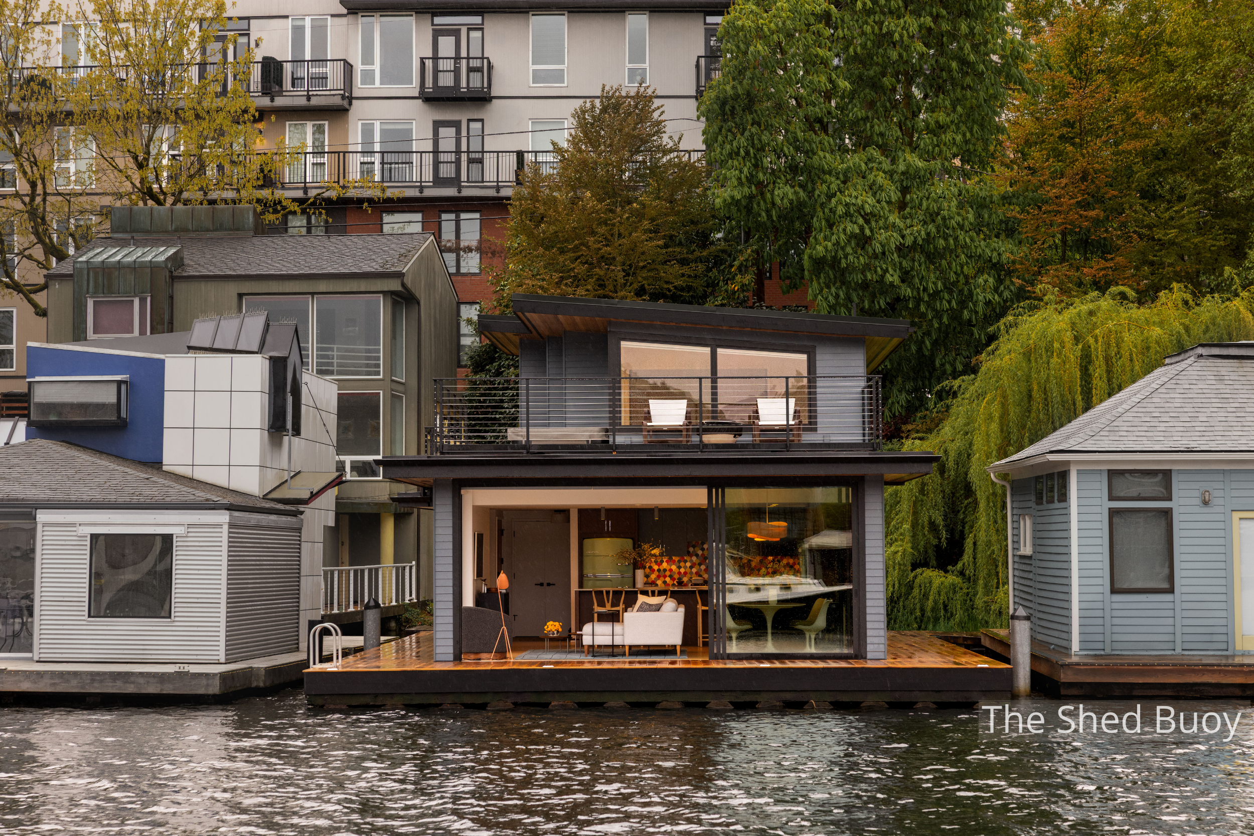 Designed for life on the water, the Rauch floating home pairs clean Northwest contemporary architecture with expansive glazing, generous outdoor living spaces, and deep roof overhangs. Every design decision responds thoughtfully to the waterfront set