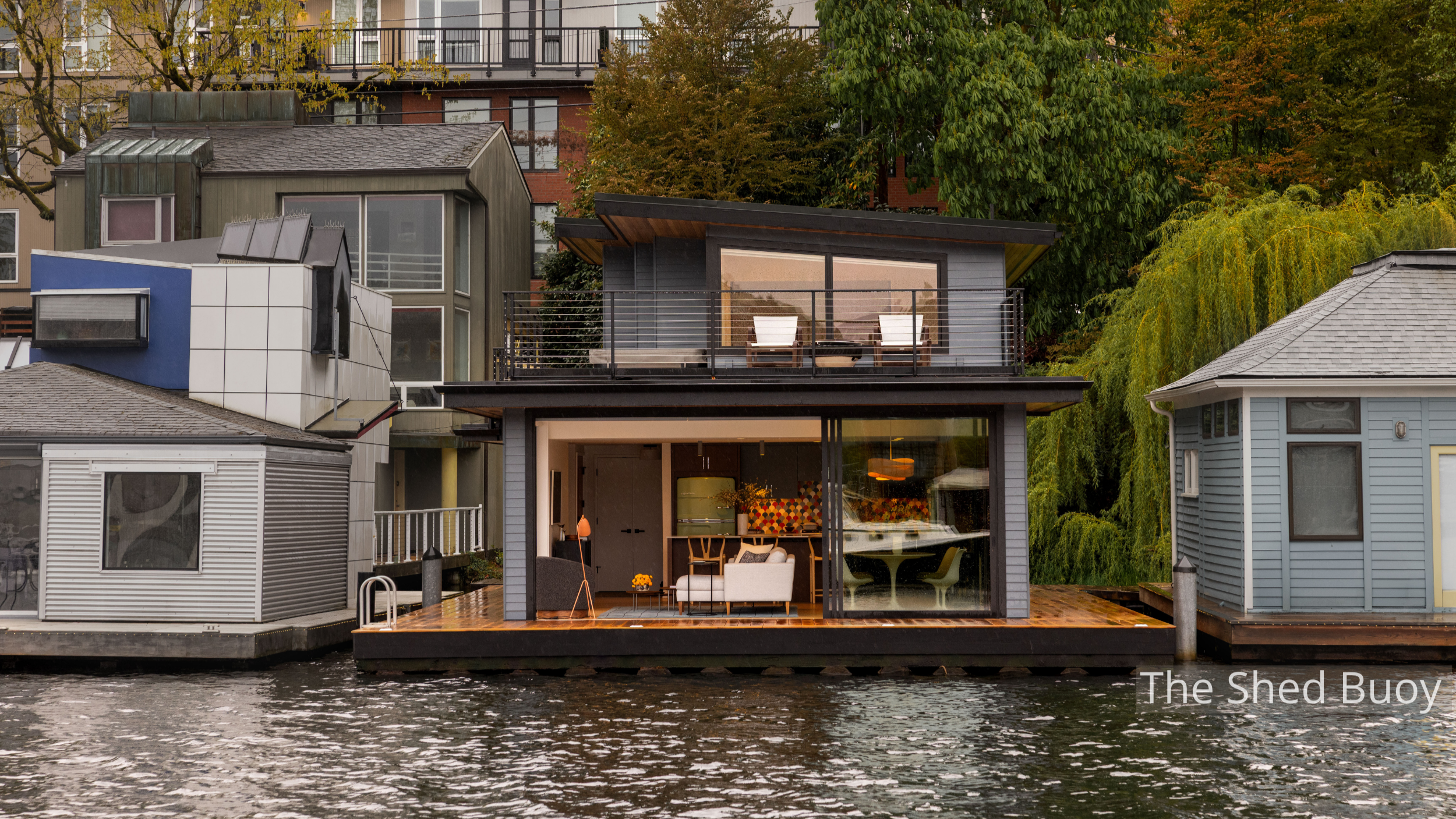 Designed for life on the water, the Rauch floating home pairs clean Northwest contemporary architecture with expansive glazing, generous outdoor living spaces, and deep roof overhangs. Every design decision responds thoughtfully to the waterfront set
