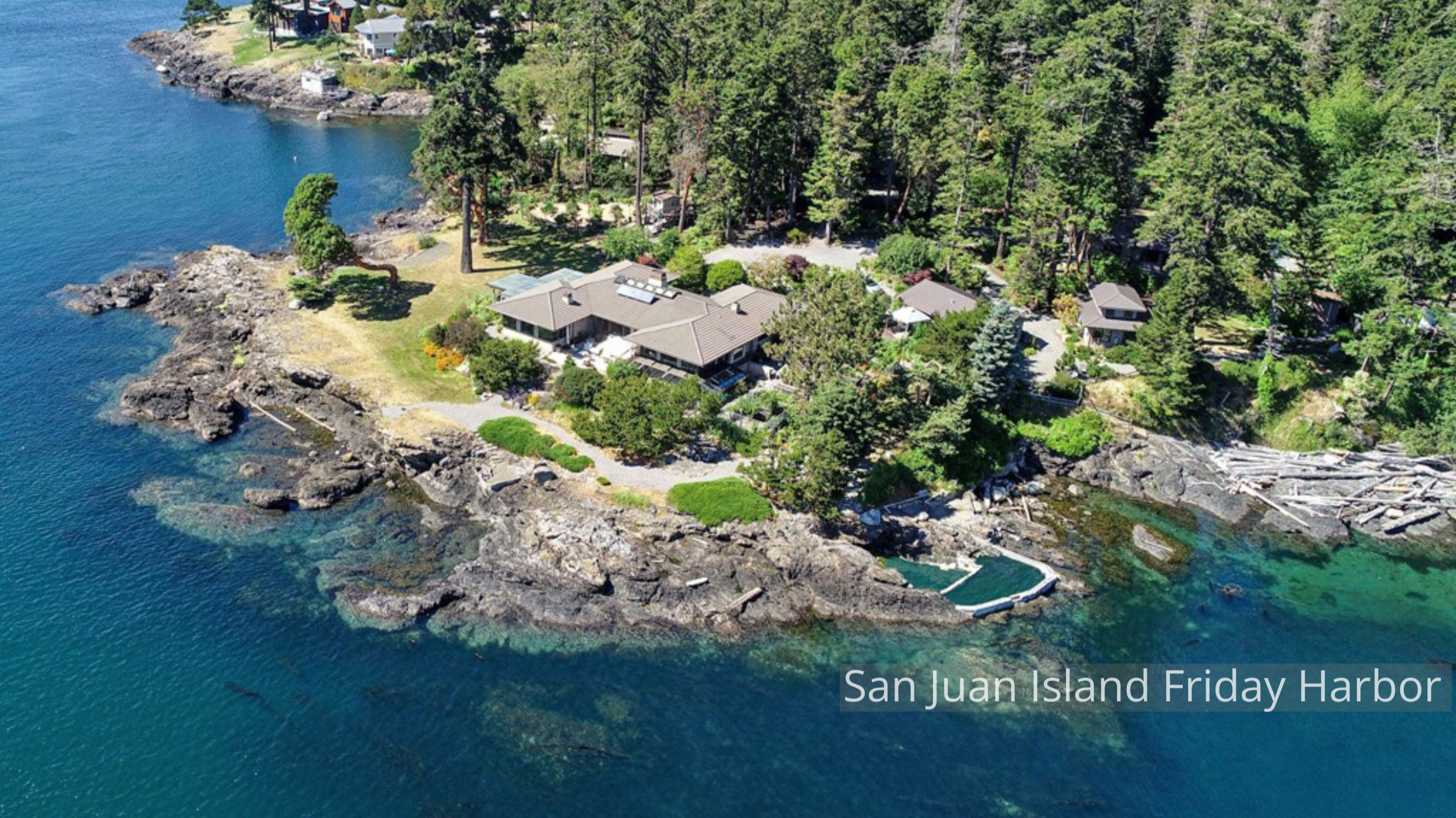 The San Juan Island New Home by ECCO Architecture blends contemporary design with the warmth of Northwest materials. Expansive windows frame panoramic views of the islands while natural textures, cedar detailing, and soft interior tones create a rela