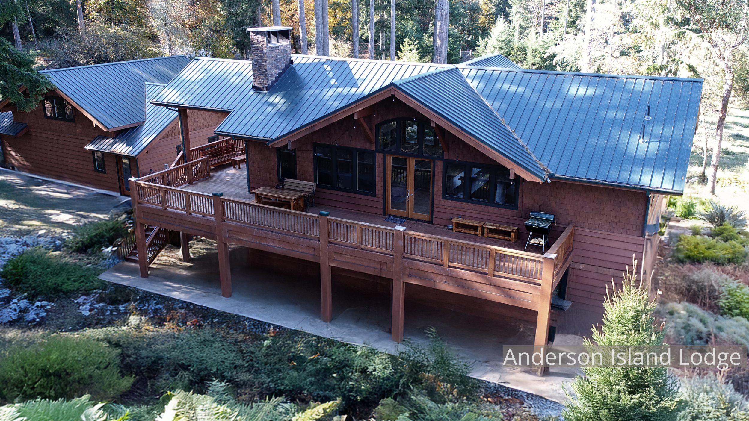 A handcrafted timber home by ECCO Architecture on Anderson Island, designed as a summer retreat for a Texas family with Pacific Northwest roots. The home’s structure and finish carpentry were milled from trees cleared on-site, creating a direct conne