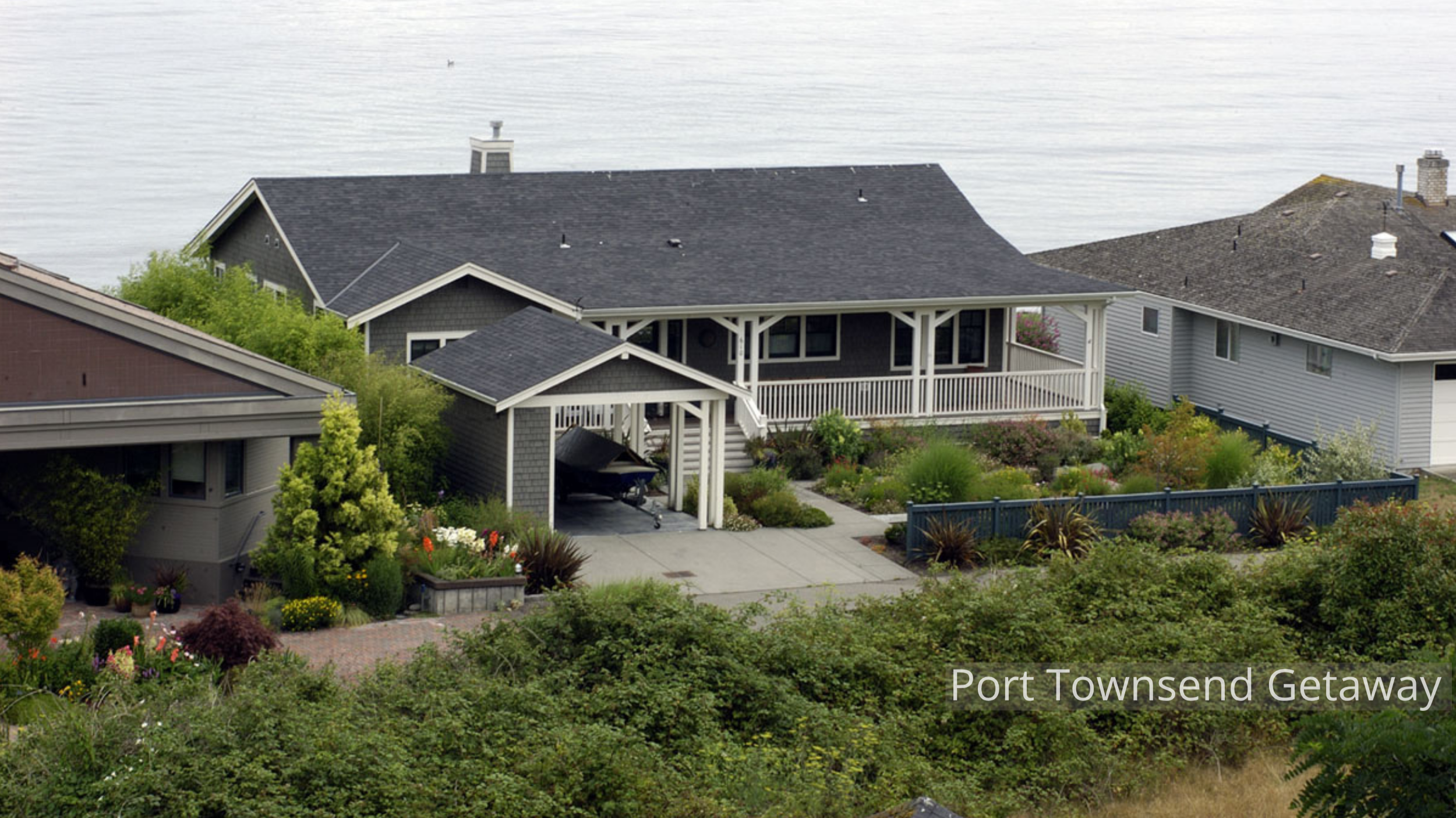 The Port Townsend New Home by ECCO Architecture reinterprets classic Cape Cod design through a Pacific Northwest lens. Clean rooflines, covered porches, and coastal-inspired materials create a warm, welcoming retreat overlooking the water. This desig