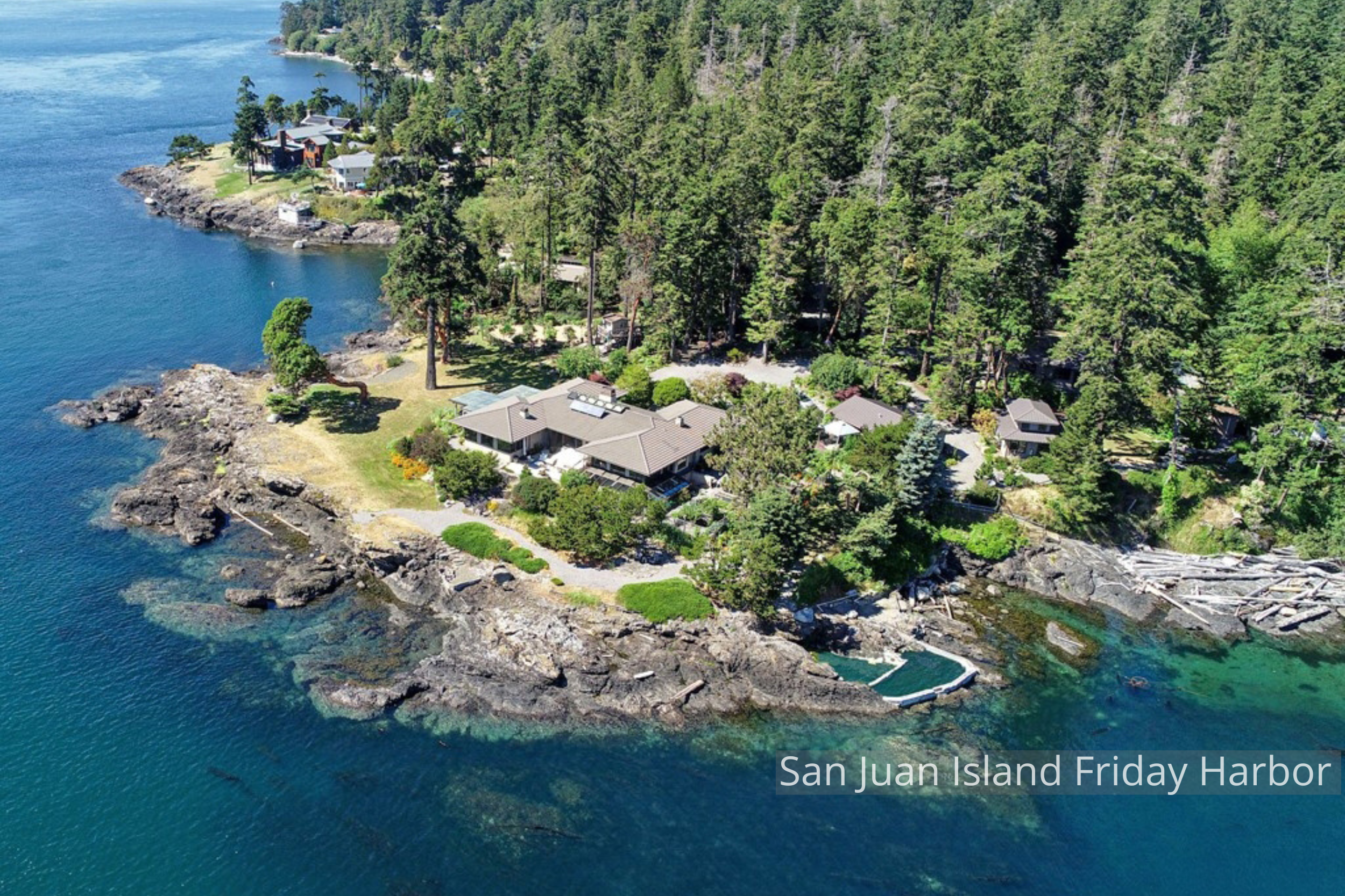 The San Juan Island New Home by ECCO Architecture blends contemporary design with the warmth of Northwest materials. Expansive windows frame panoramic views of the islands while natural textures, cedar detailing, and soft interior tones create a rela