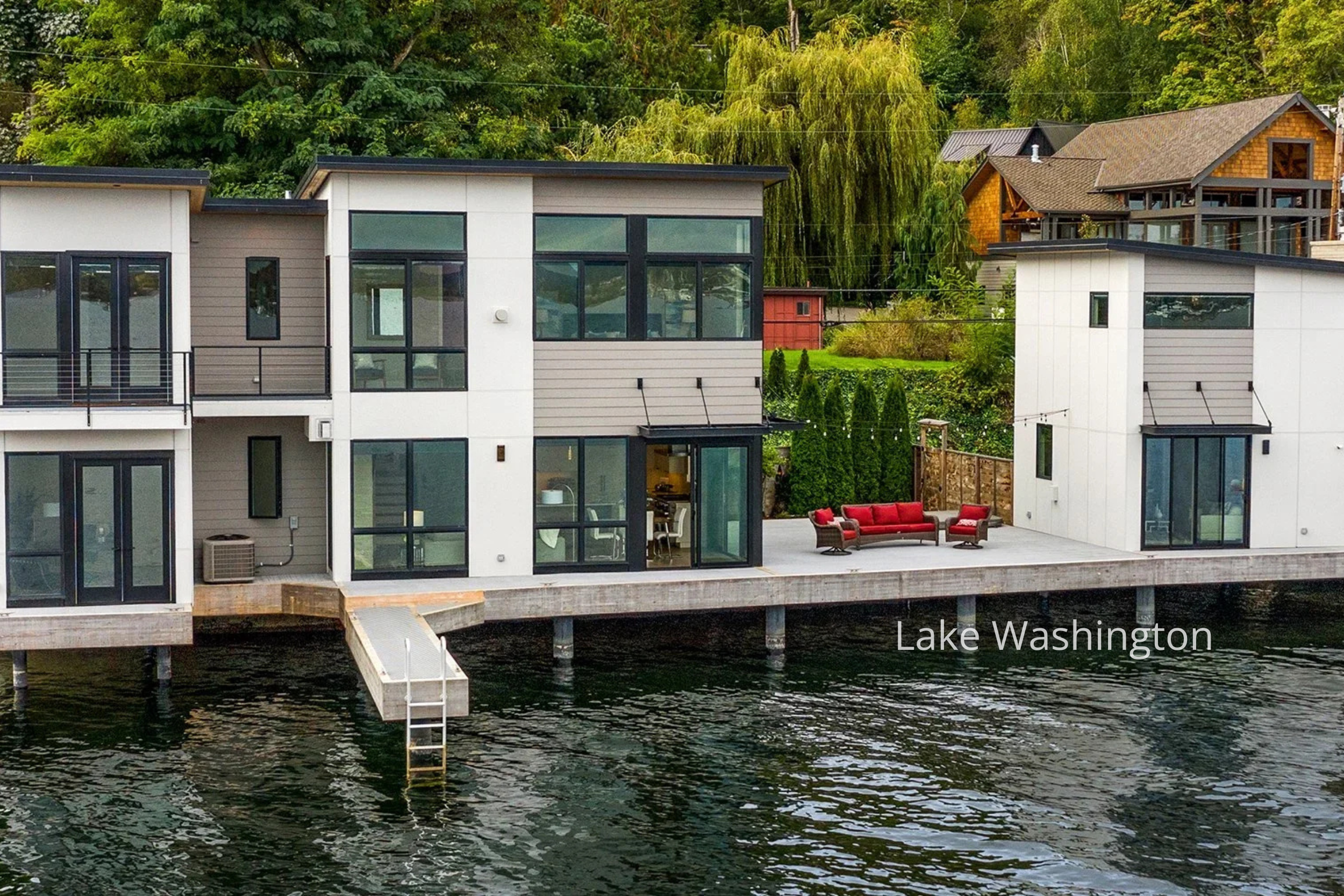 The Lake Washington New Home by ECCO Architecture features a modern waterfront residence designed to maximize lake access and outdoor living. Clean-lined volumes, expansive glazing, and direct dock connections create a seamless relationship between t
