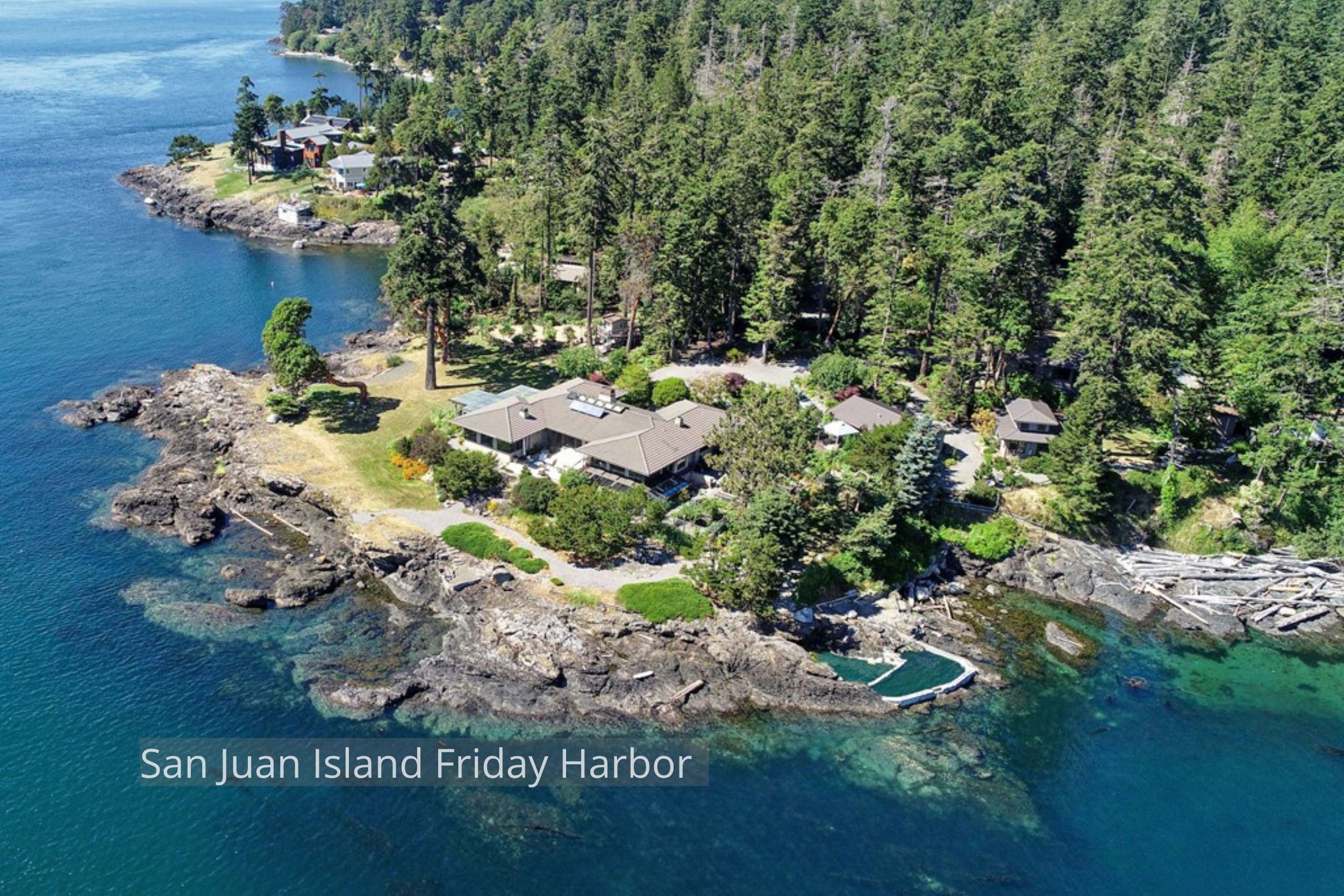 The San Juan Island New Home by ECCO Architecture blends contemporary design with the warmth of Northwest materials. Expansive windows frame panoramic views of the islands while natural textures, cedar detailing, and soft interior tones create a rela