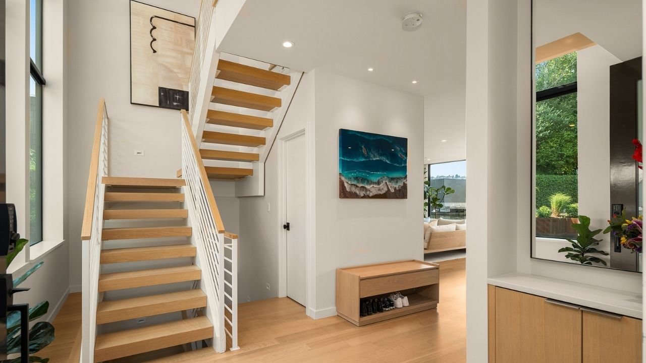 mallard-cove-modern-entry-open-staircase.jpg.jpg