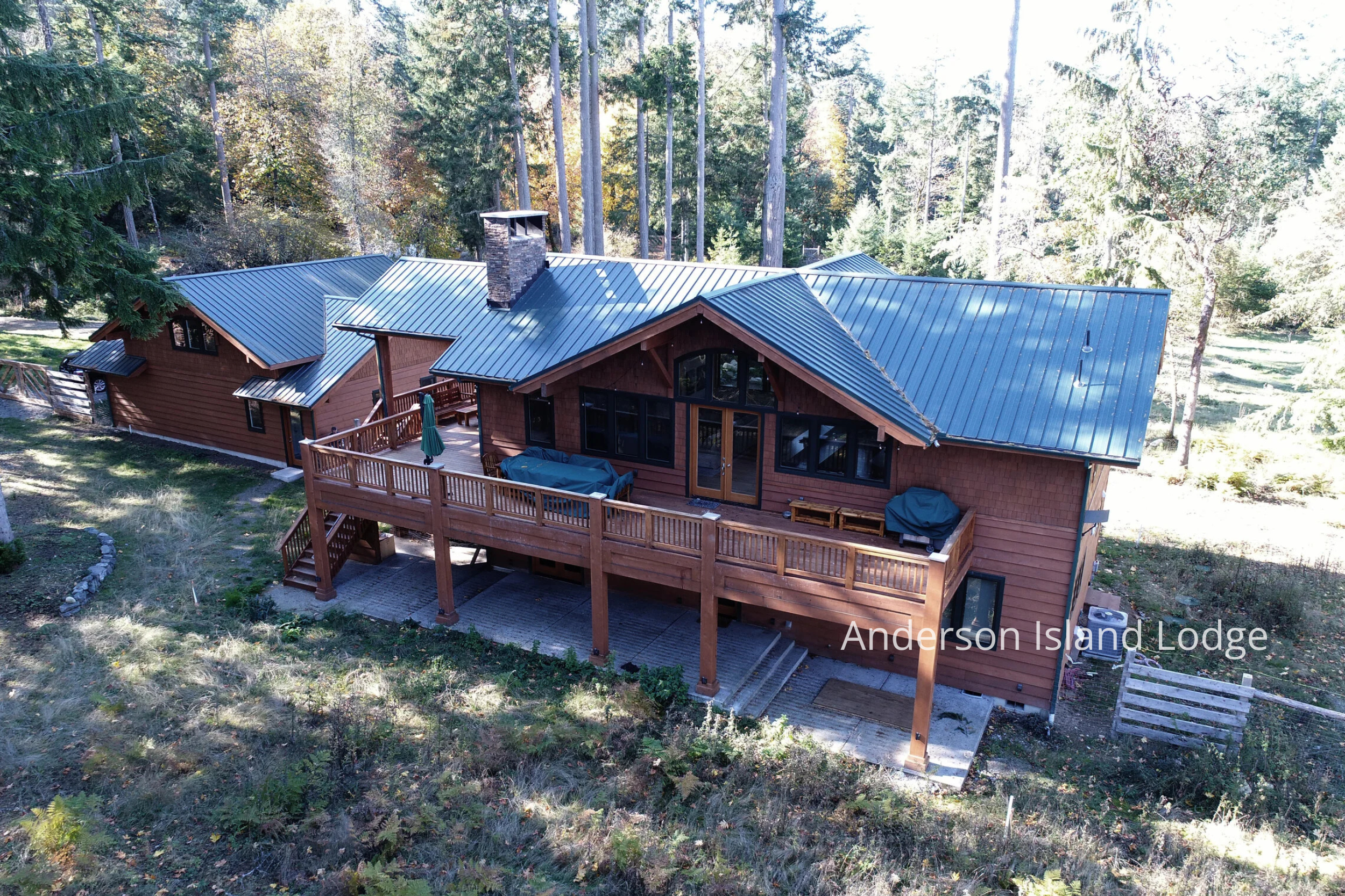 A handcrafted timber home by ECCO Architecture on Anderson Island, designed as a summer retreat for a Texas family with Pacific Northwest roots. The home’s structure and finish carpentry were milled from trees cleared on-site, creating a direct conne