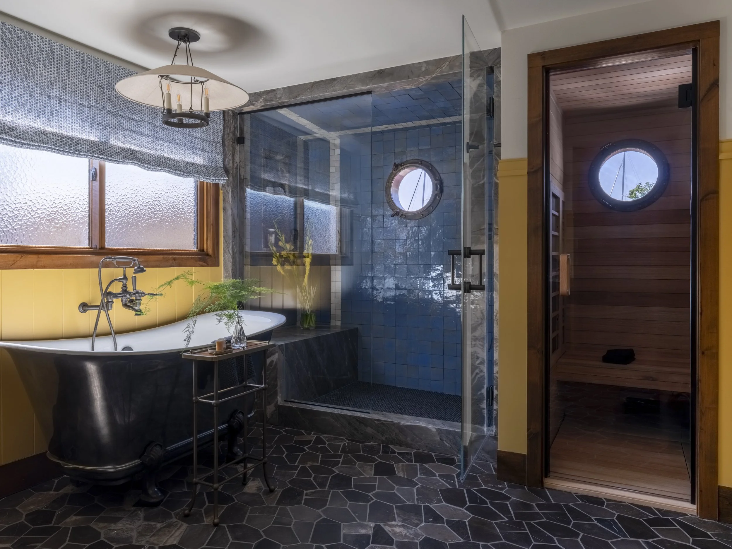 Nesika Chuck Floating Home | Seattle, WA

Waterfront bathroom featuring patterned tile, modern vanity, and windows positioned to capture Lake Union views.