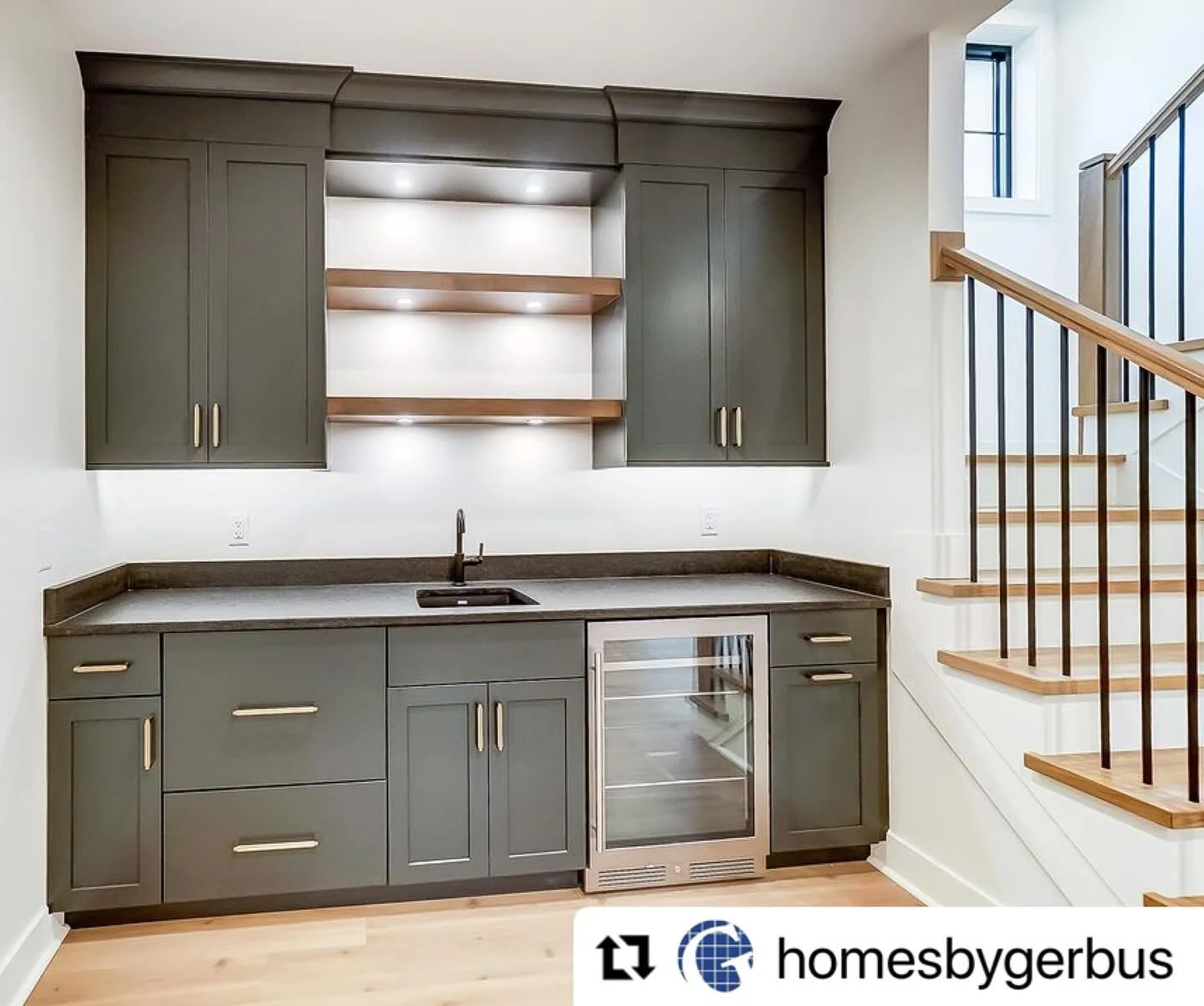 Iron Ore cabinets with walnut floating shelves create a moody and modern bar area in this new lower level space.  Designs by Pam Monk. π©Ά
.
.
.
#Madisonhousecabinetry #cincinnati #designers #cincinnatidesigner #interiordesigner #cabinet #customcabine