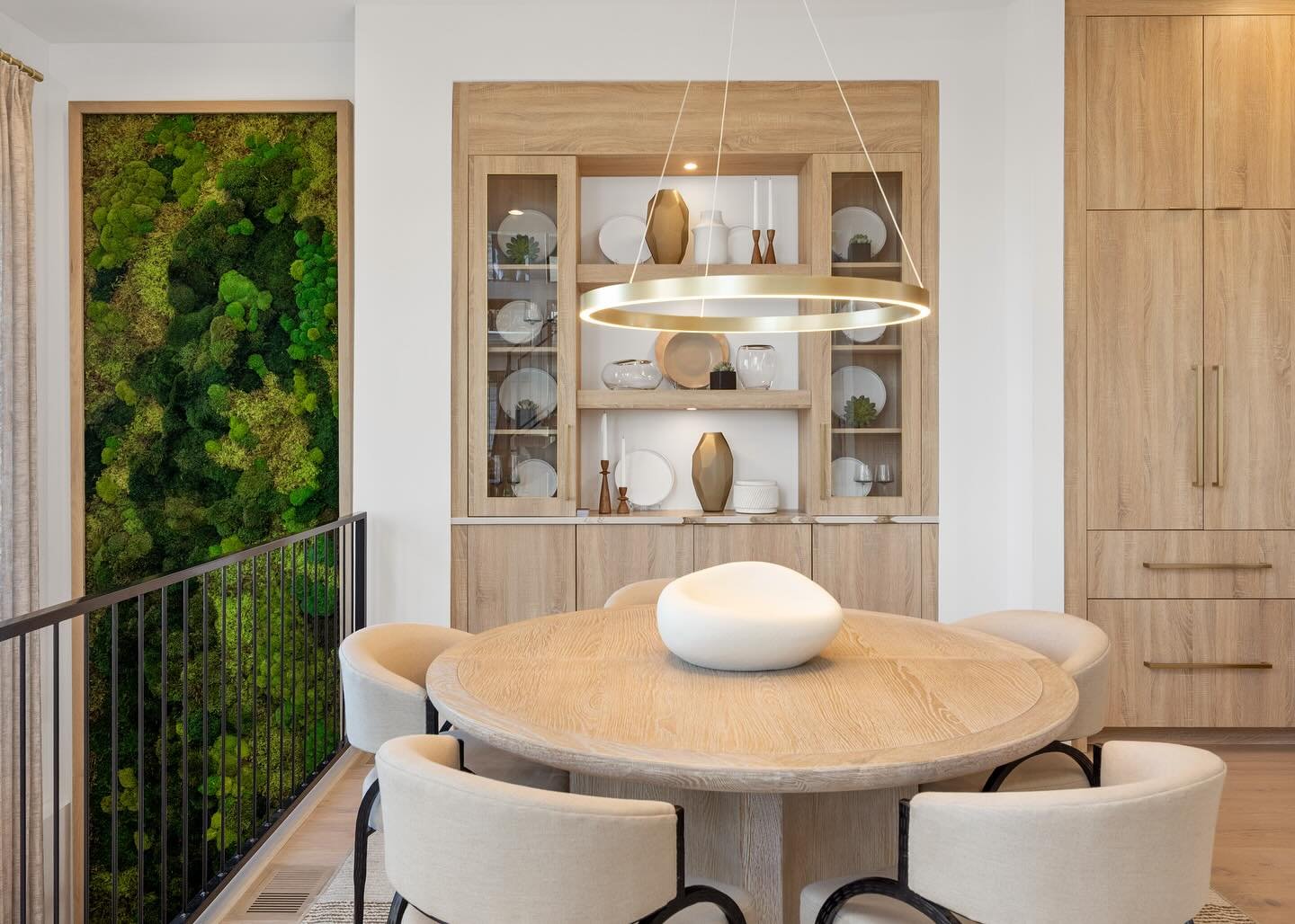 Seamless storage with style! The light oak cabinetry look adds warmth and cohesion, framing the space with a soft and organic feel. 
.
.
.
#cincinnaticabinetry #customcabinetry #diningroombuiltins #modernliving #tflcabinets #eclipsecabinetry