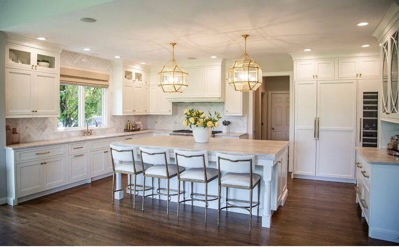 Swipe to see the before of this gorgeous kitchen remodel! We&rsquo;ve totally maximized the homeowners space to get the most storage and entertaining potential with a bright and airy feel!