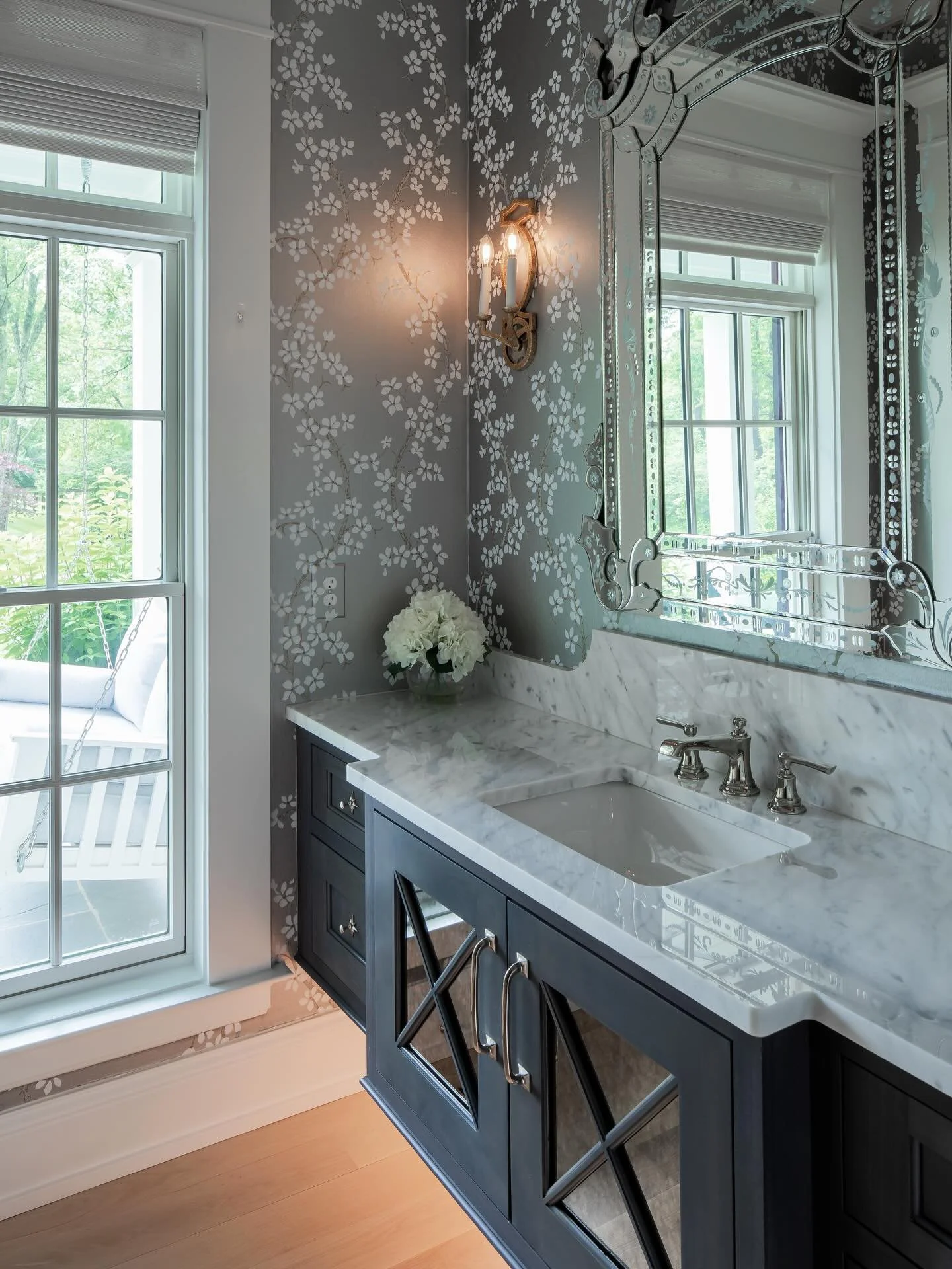 Floating cabinets can be traditional too! The prettiest of powder rooms with this under lit floating cabinet with gorgeous mirrored fronts and plenty of storage!