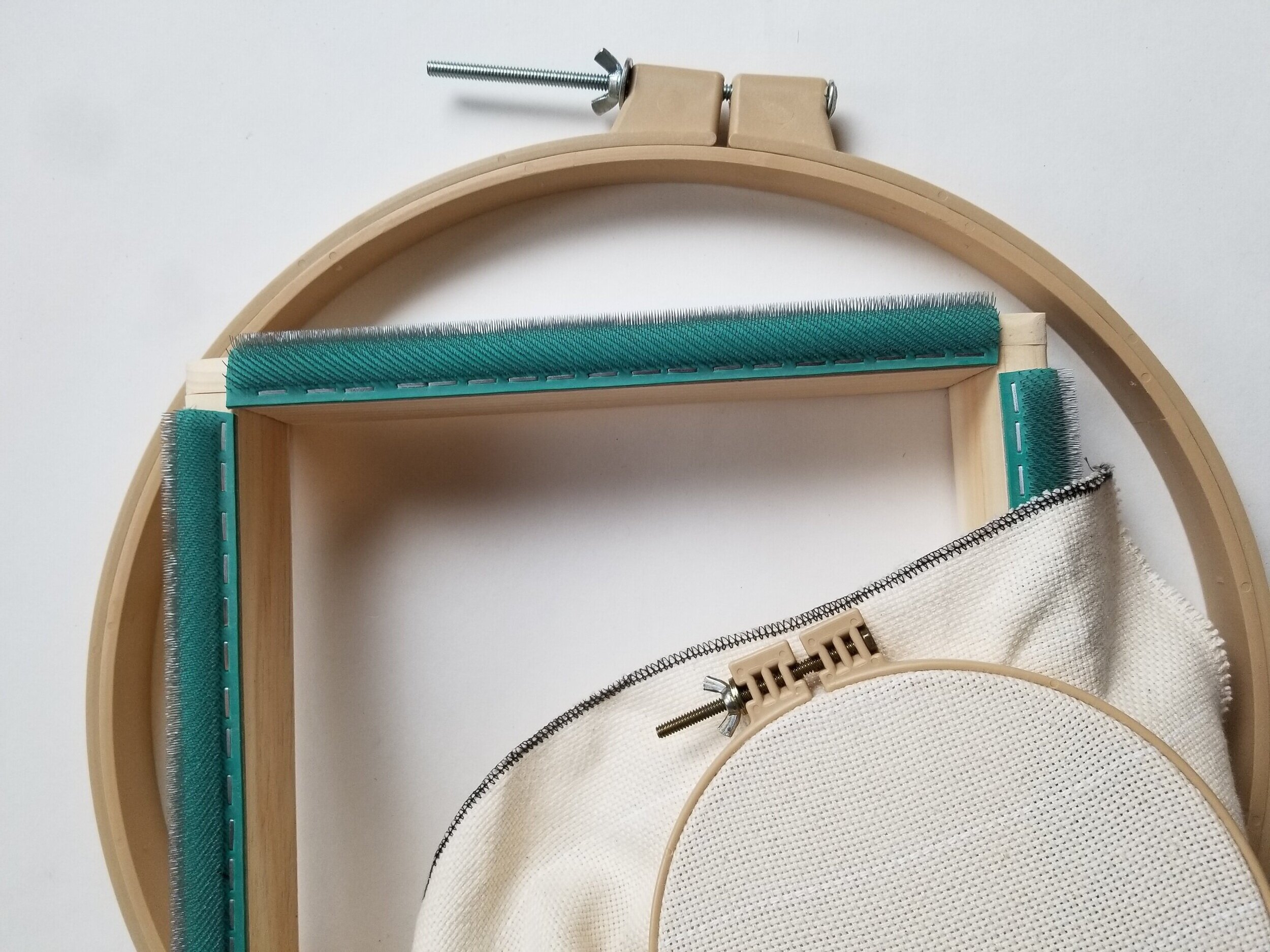 Shown: Two sizes of no-slip hoop and one gripper strip frame.