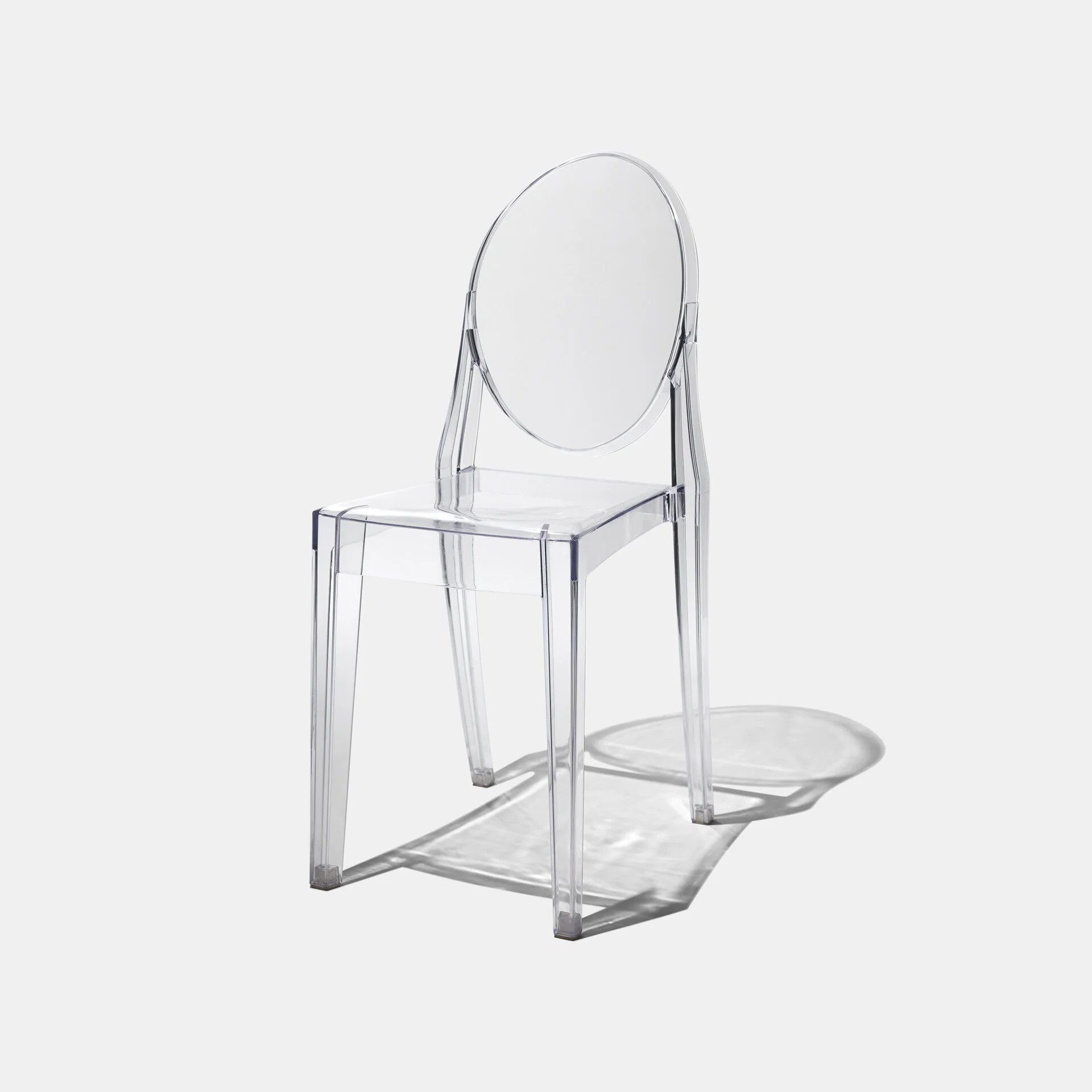 Clear chair product photographer hard shadows