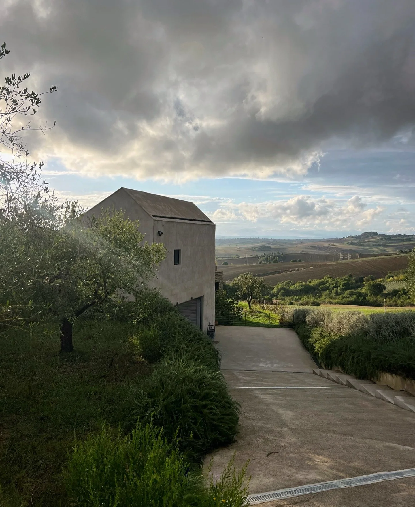 View coming back after an early evening walk after the rain broke. That dramatic time where the dark cloud and bright sunshine combine. #agradolce #casasulchiaro #italy