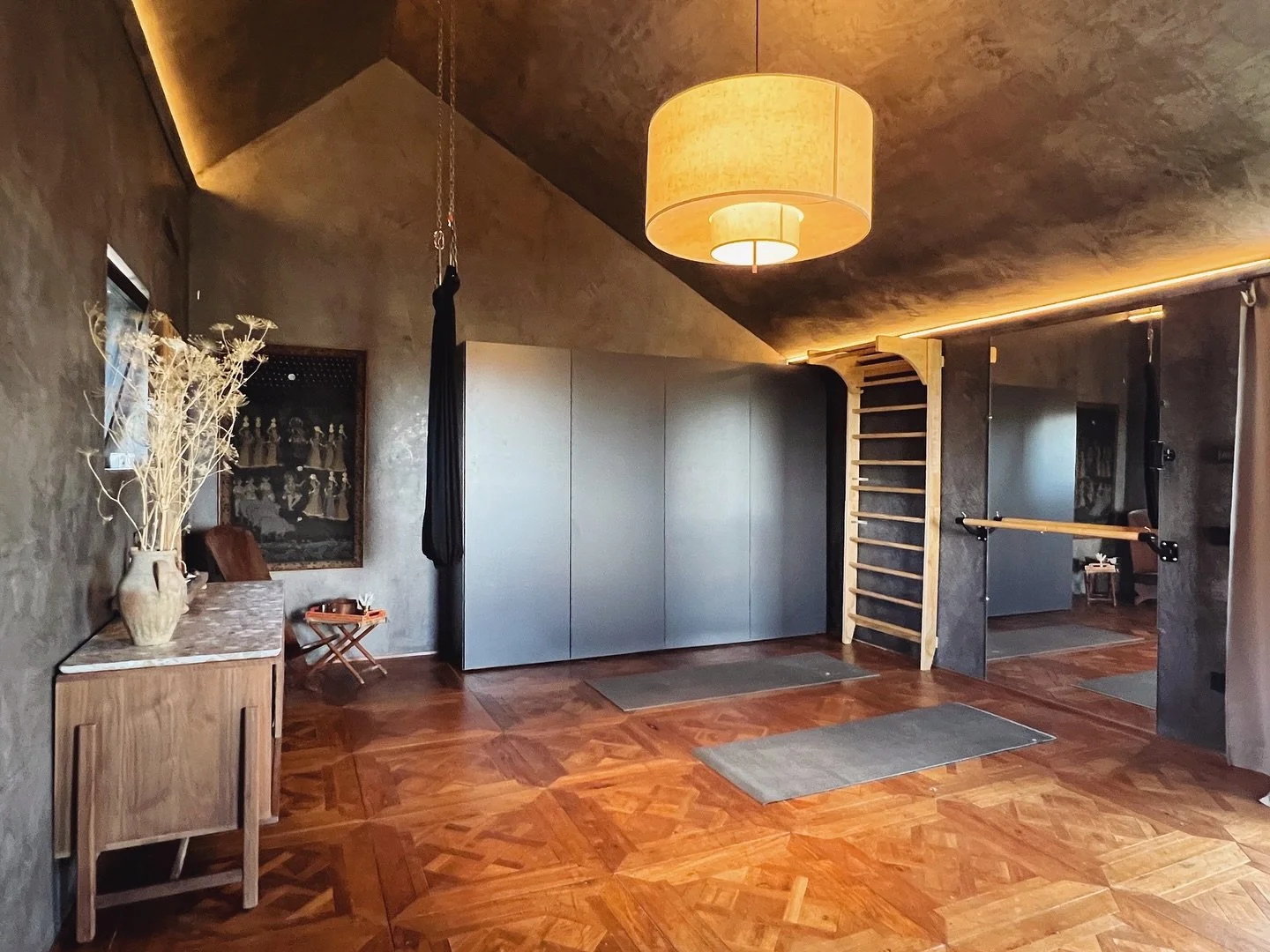 Room feature: Studio. ◾️ This room has been evolving from the beginning but was designed for our yoga, breathwork, and workout space and has lately been coming together a bit more with the recent installation of a custom wall closet. This hides a lot