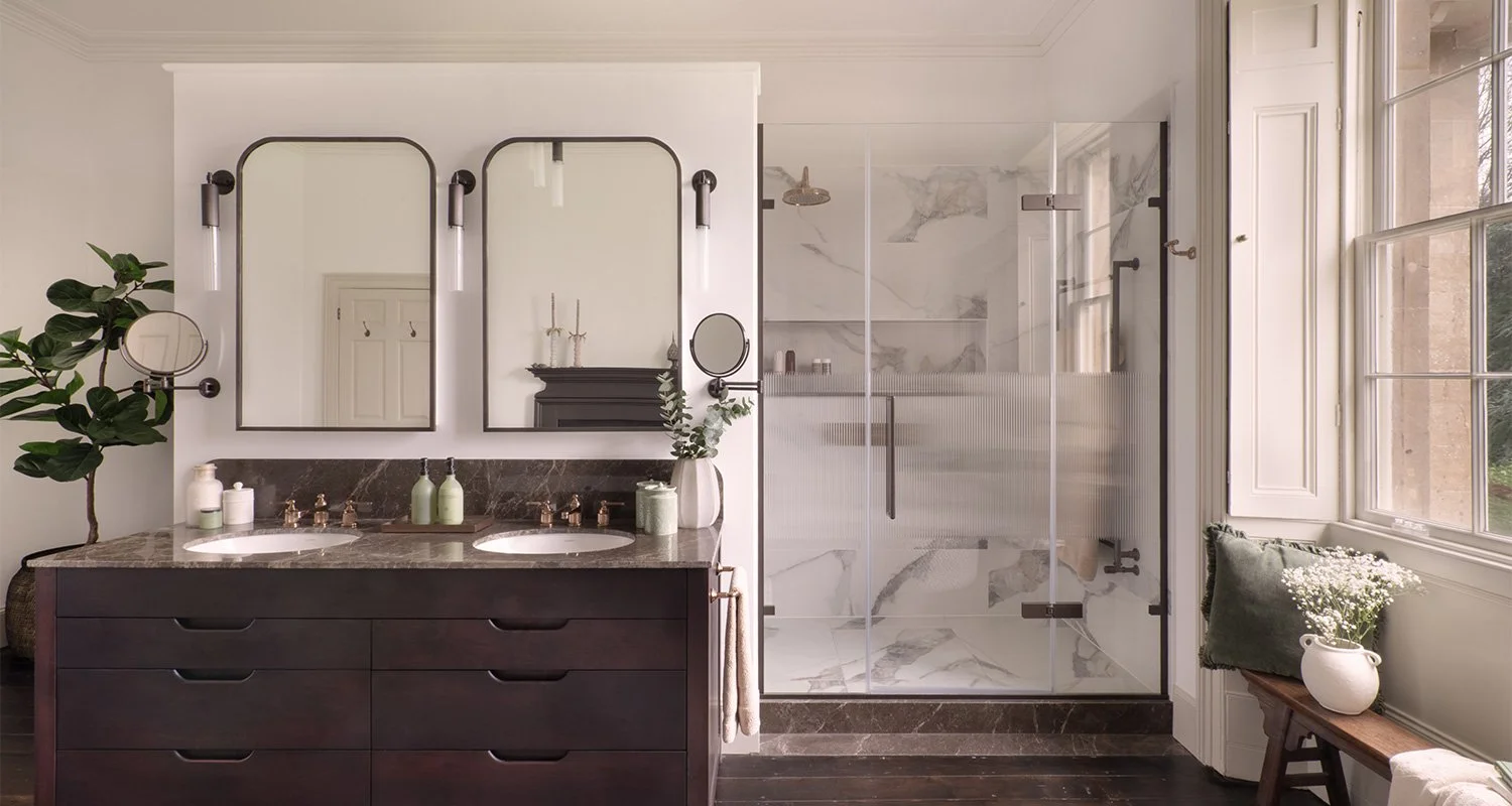 Georgian manor master ensuite with warm tones, open layout, and a blend of traditional and contemporary design and double basin.