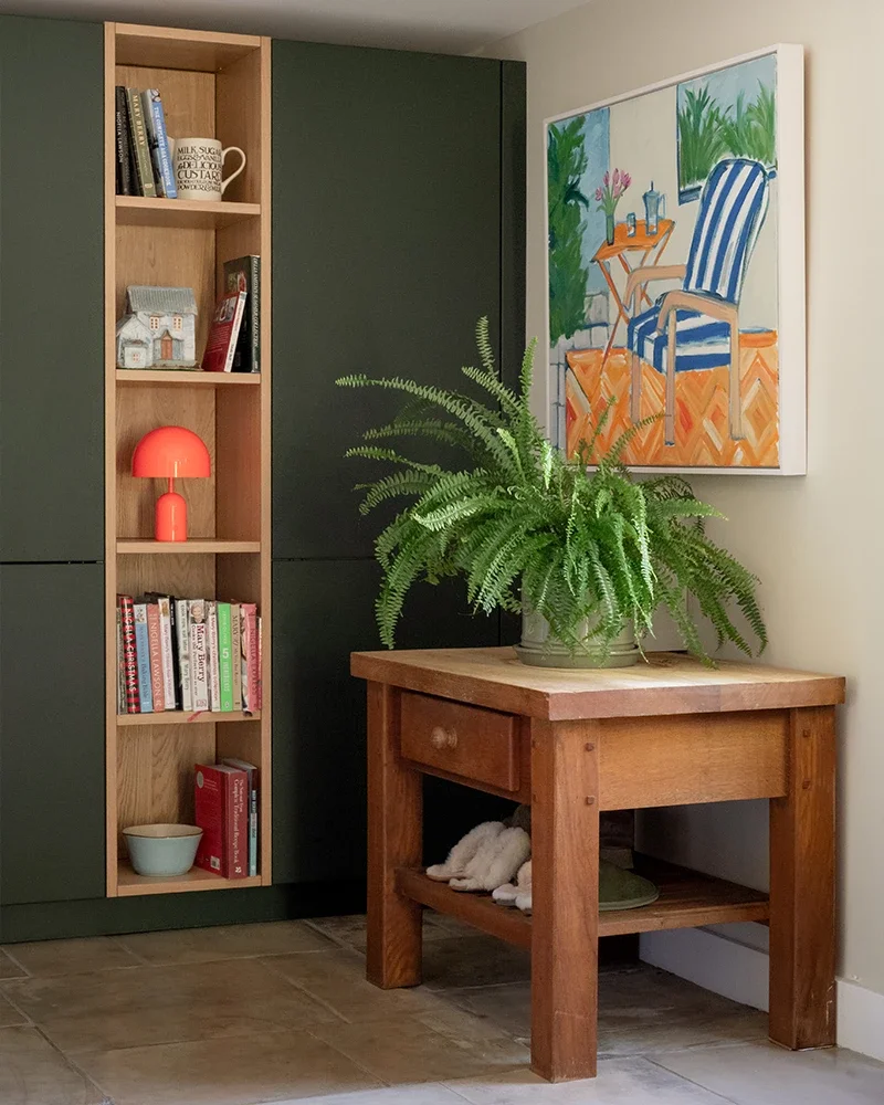 Forest green entrance shelving with integrated LED lighting