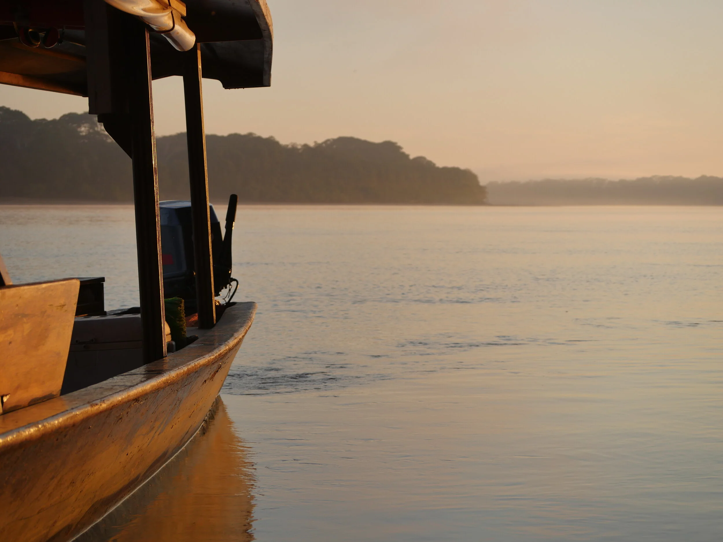 Peru, sunrise over Madre de Dios River (Amazon tributary), 2019