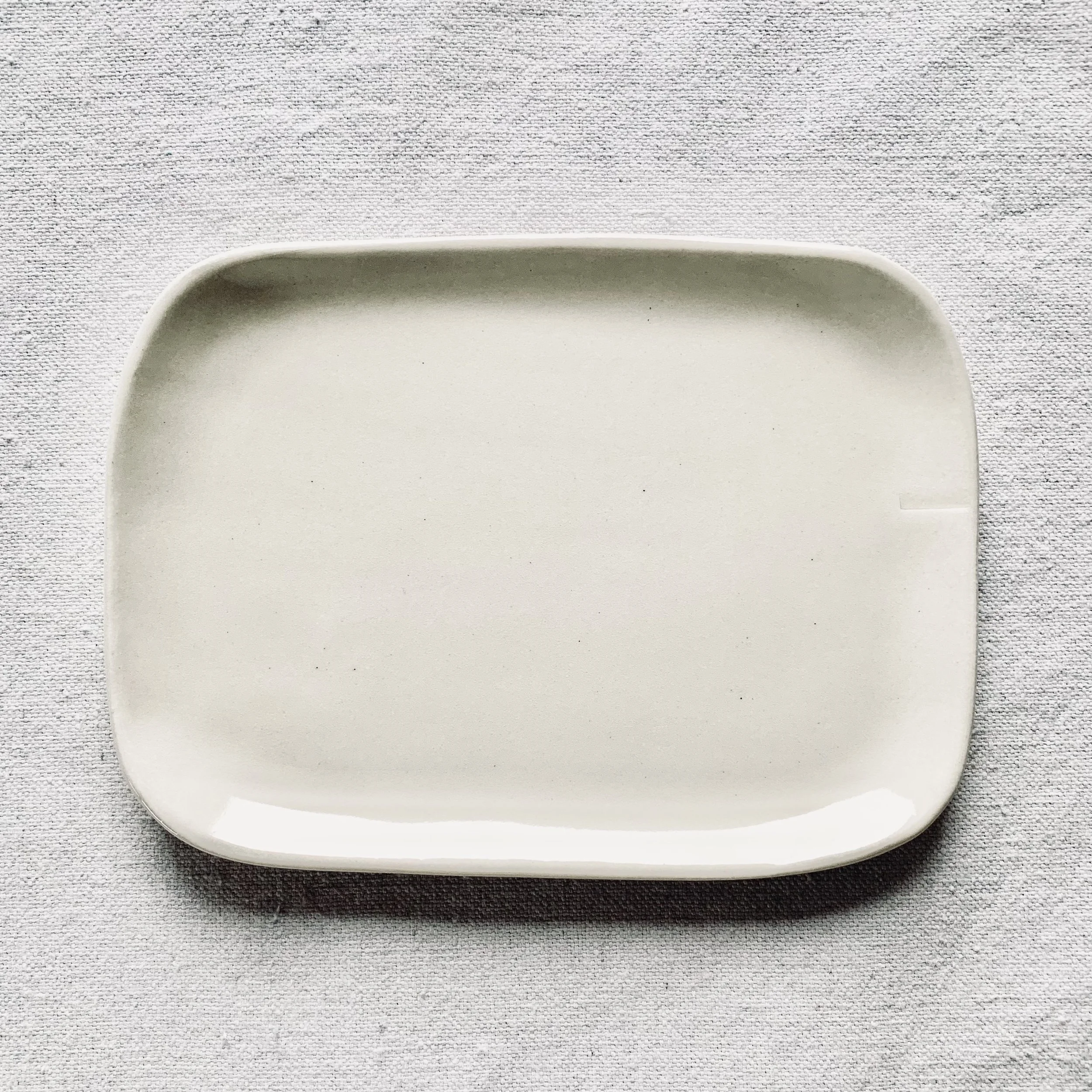 lined rim almost square tray