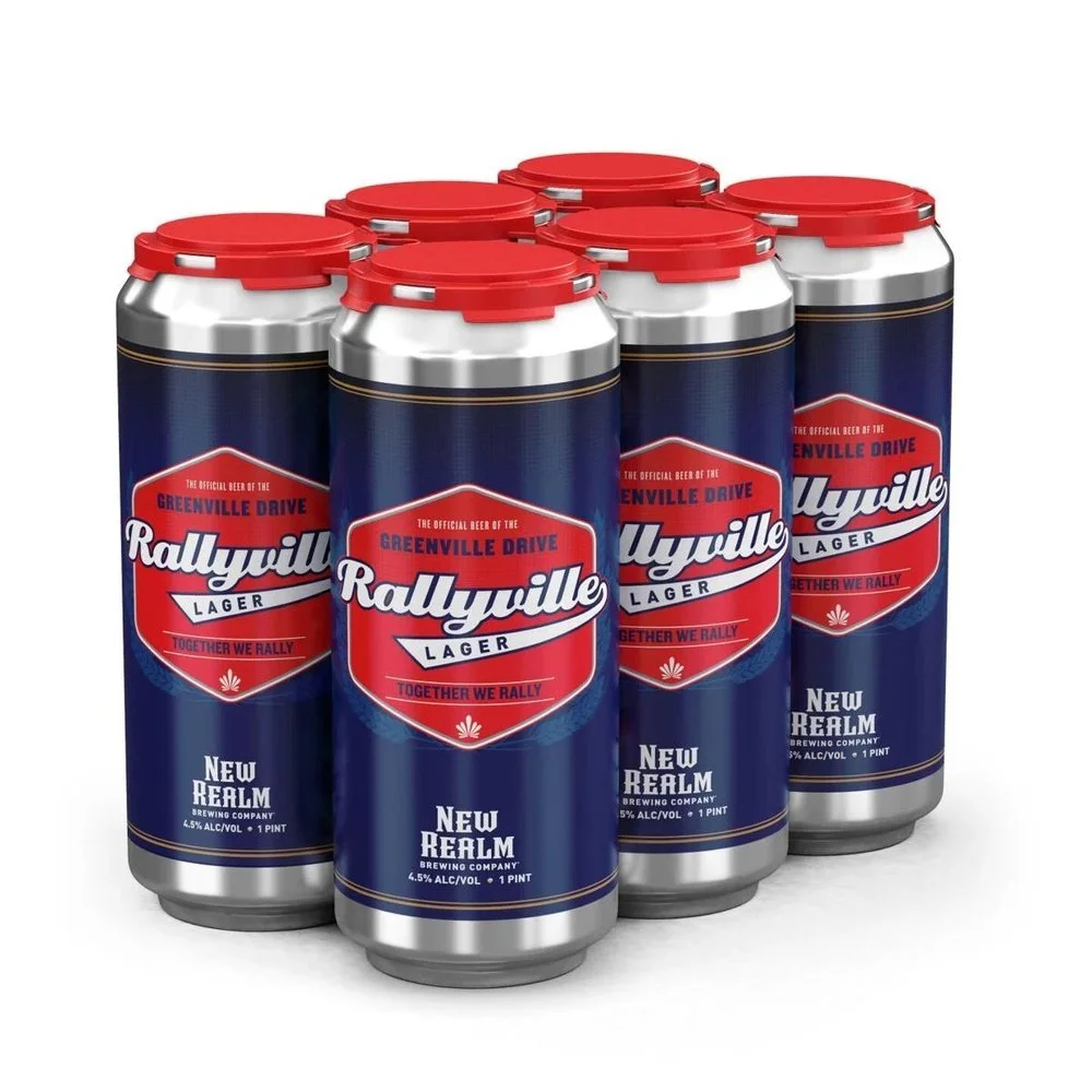 Six-pack of Rallyville Lager by New Realm Brewing Company with blue and red packaging.