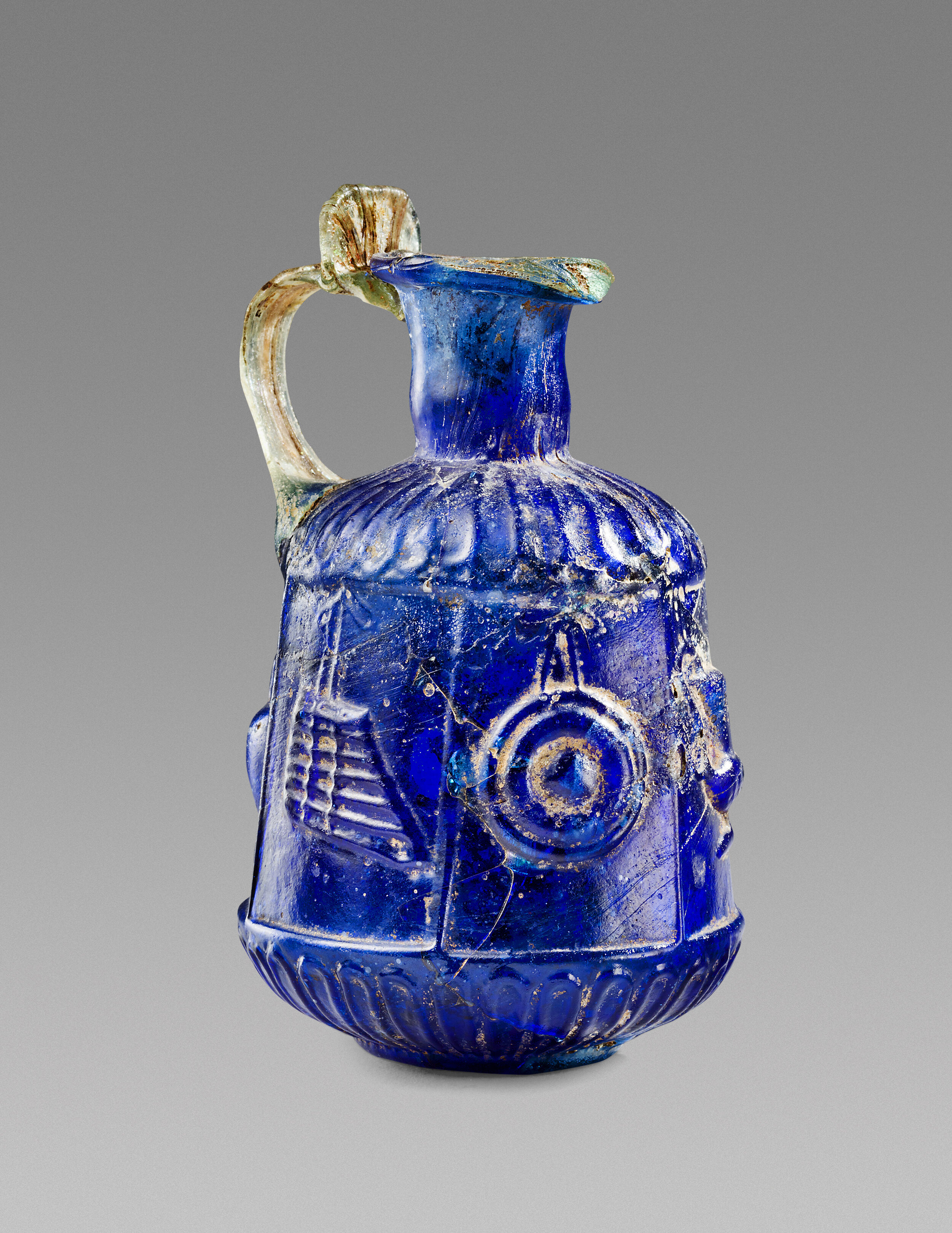 Ancient Roman Cobalt Blue Glass Jug with Symbols of Dionysiac Revelry
