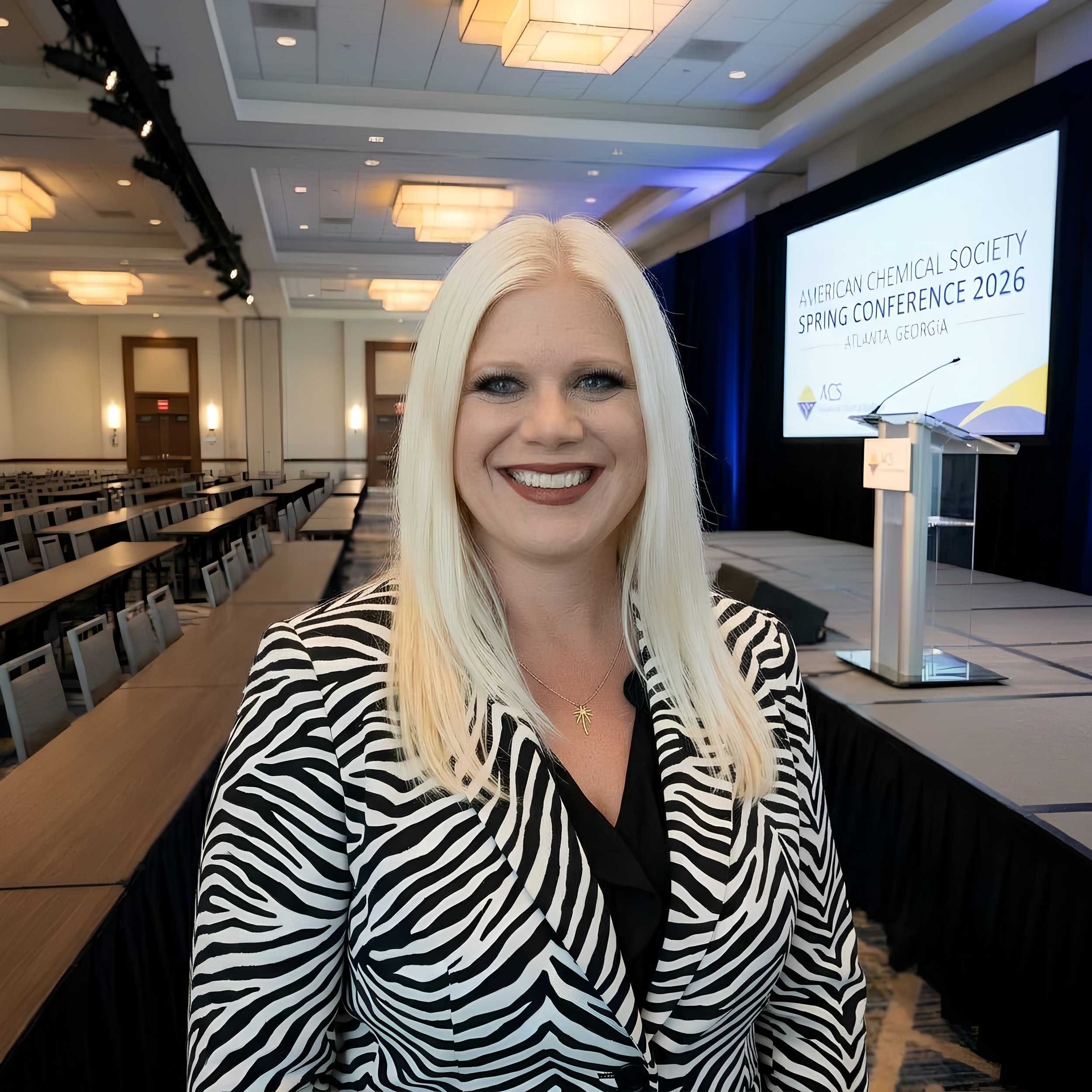 Blonde woman in a zebra jacket at the ACS SPring Conference in Atlanta Georgia