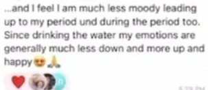 A screenshot of a text message discussing improved mood and emotions after drinking water, ending with emojis of a heart, dog, and prayer hands.