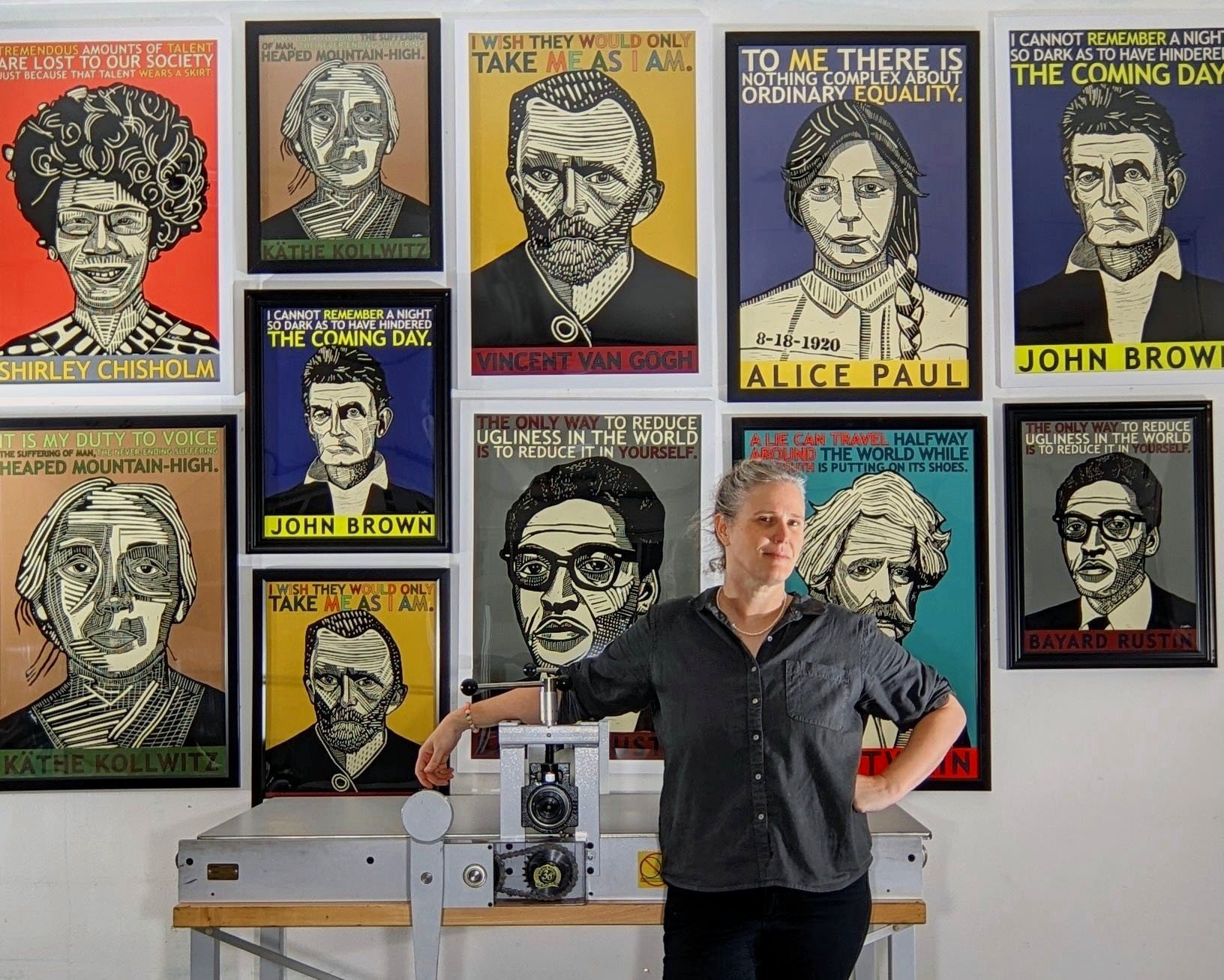 V. Wallace with Portrait Posters