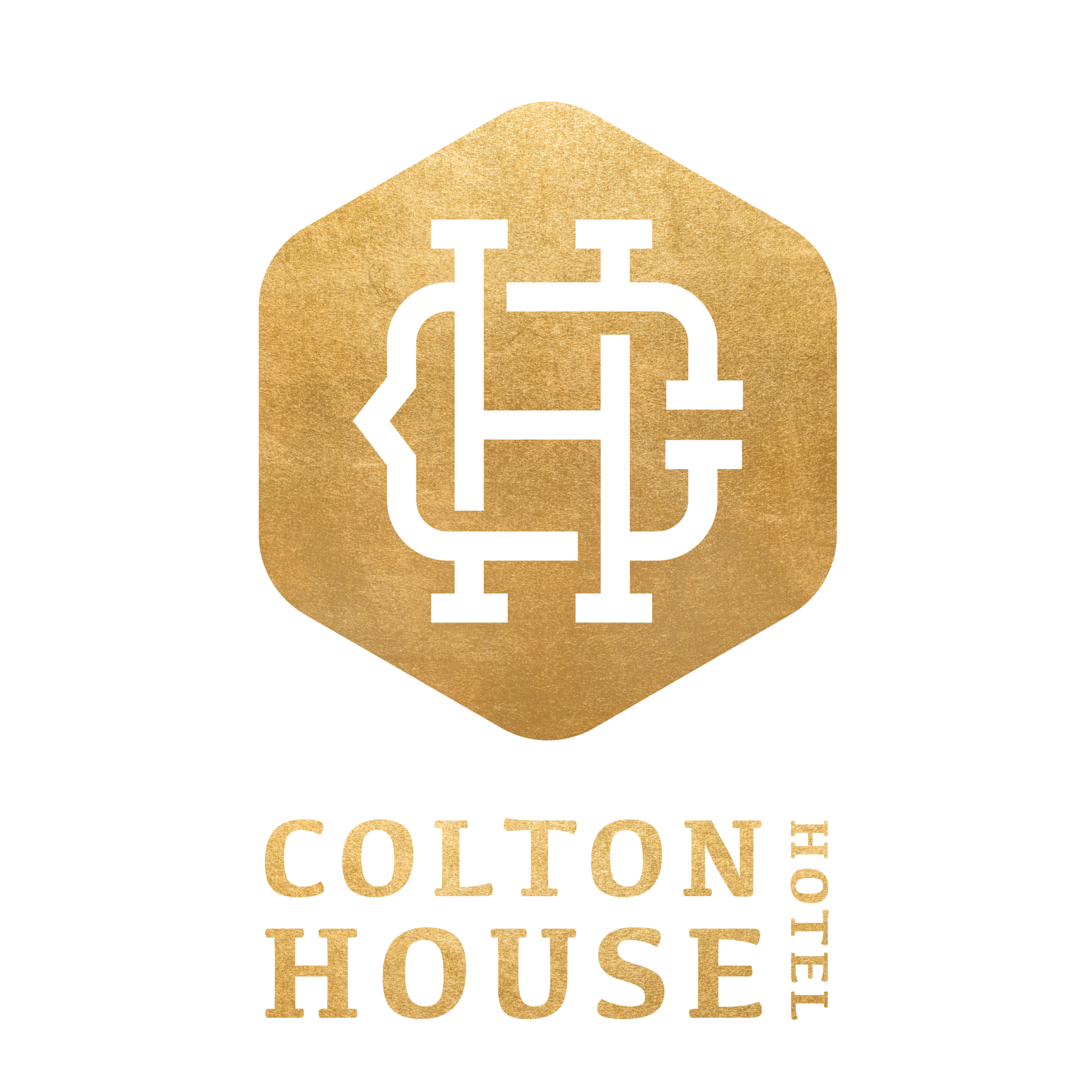 Logo for the Colon House featuring a white house outline with interconnected pipes inside a gold octagon and the words "Colon House" below in gold.