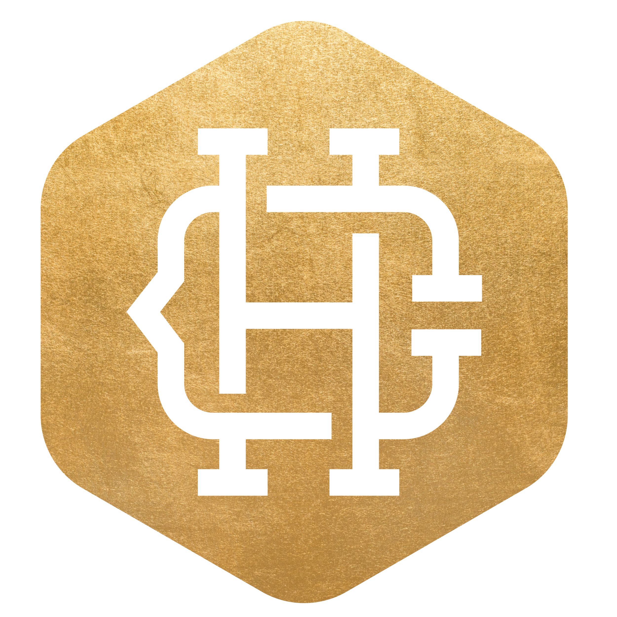 Gold-colored hexagon with a white line drawing of an industrial pipe system