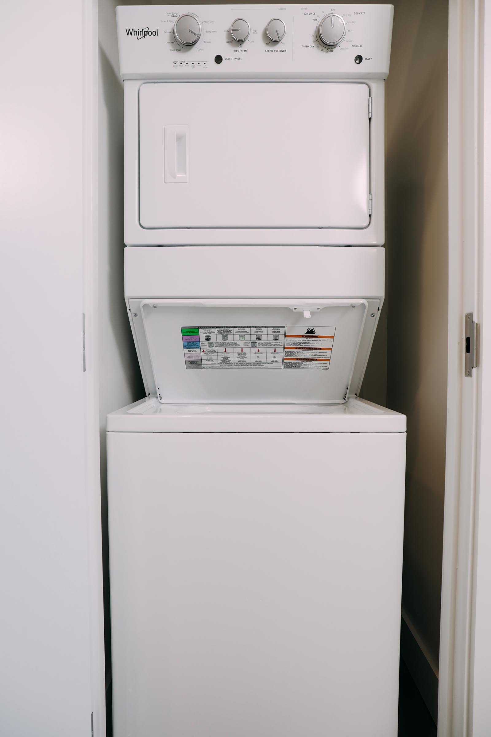 stacked washer/dryer in closet 