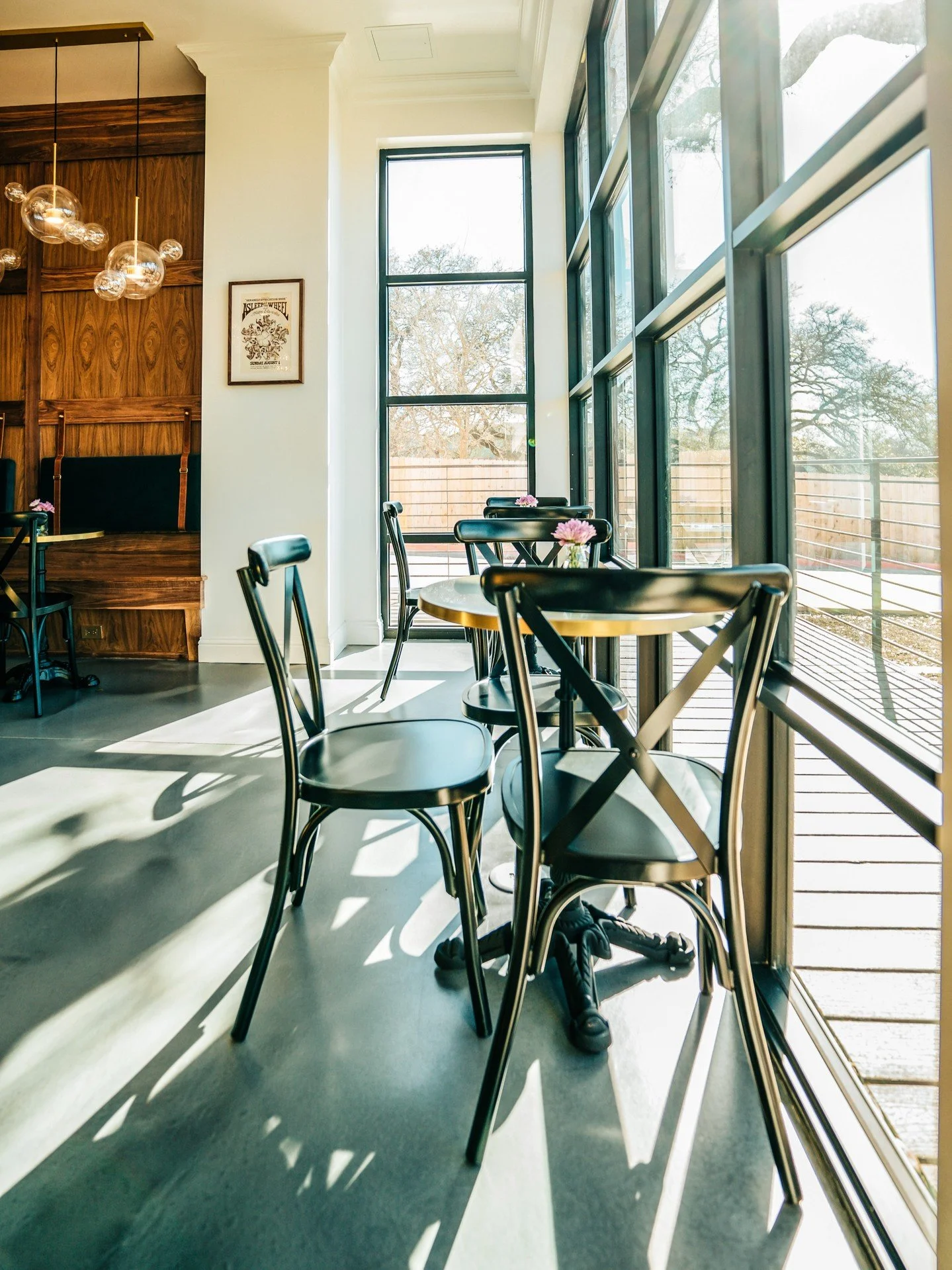 You can never go wrong with a window seat.
Bask in the warm glow of sunshine, and your choice of coffee or cocktail to match the moment.