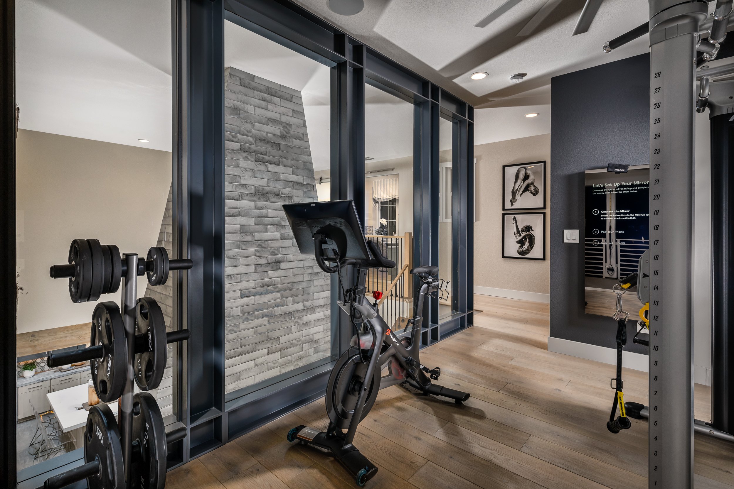 17-We_Bridge House_Home Gym through Beams.jpg