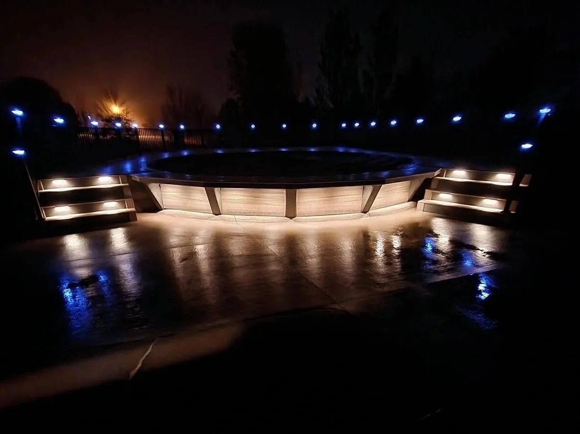 composite pool deck with metal railing and integrated lighting