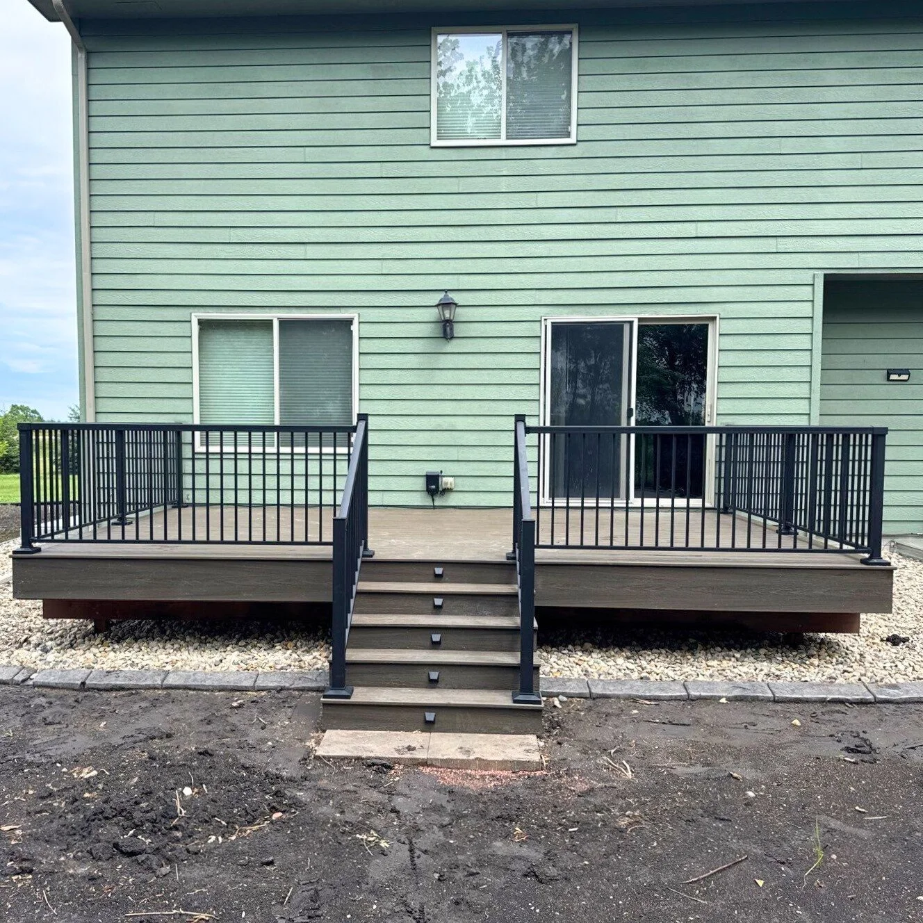 trex composite deck with composite fascia deck skirting and star black aluminum railing