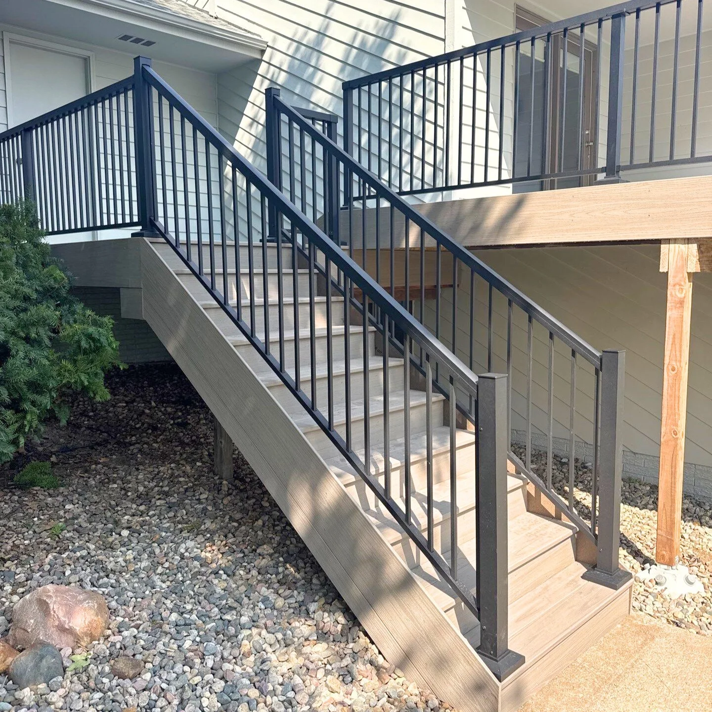 trex composite deck with composite fascia deck skirting and star black aluminum railing