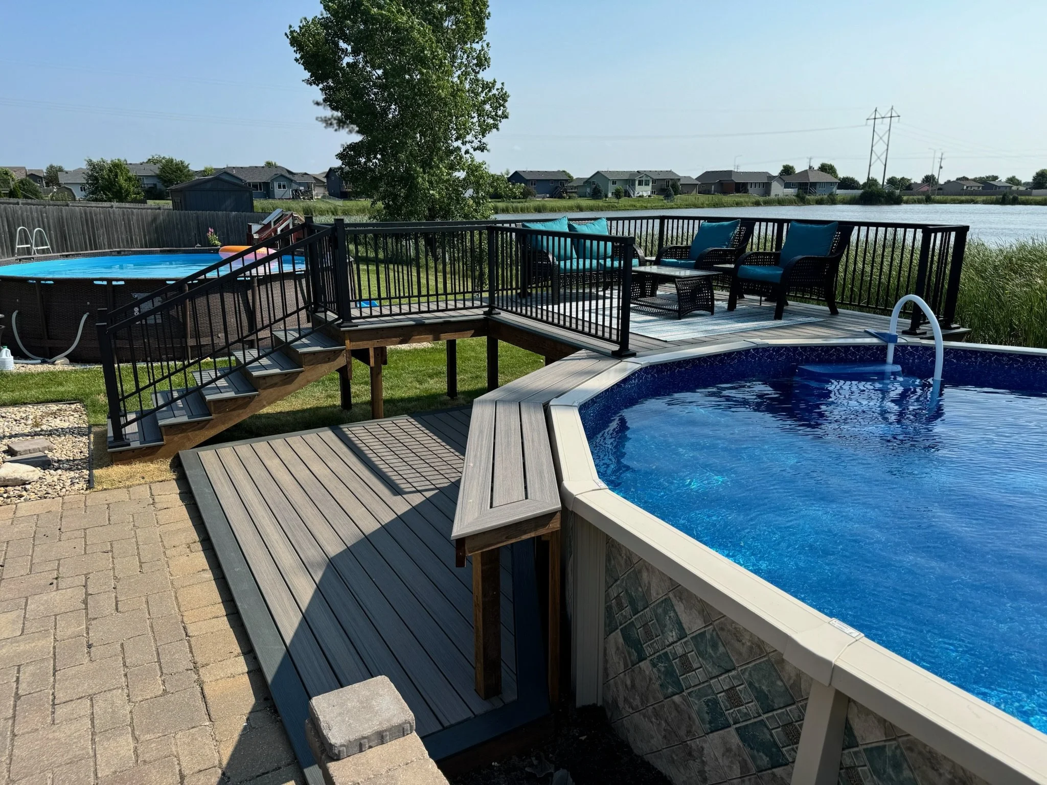 composite pool deck with bar and aluminum railing