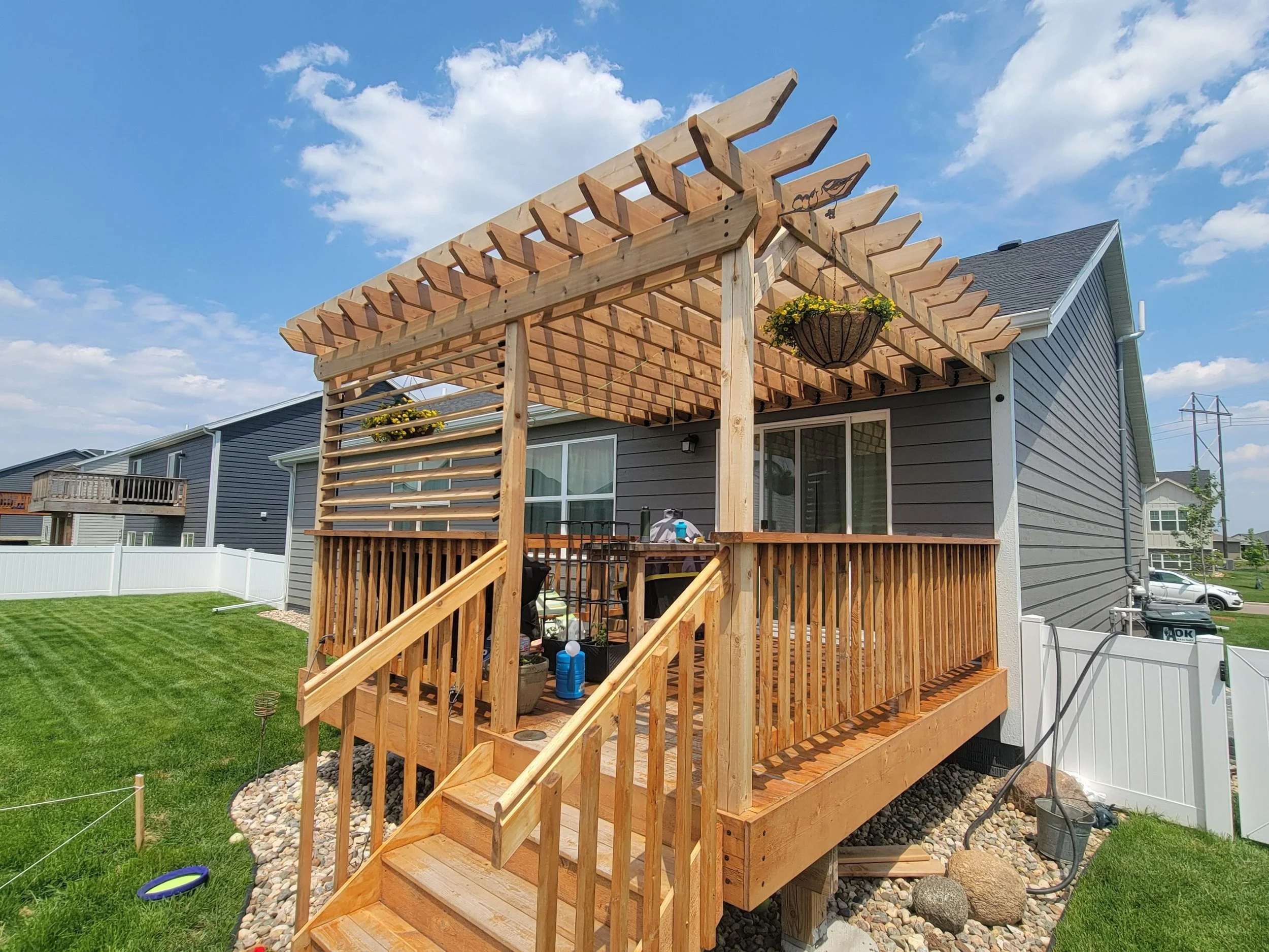 cedar pergola with louvered wall