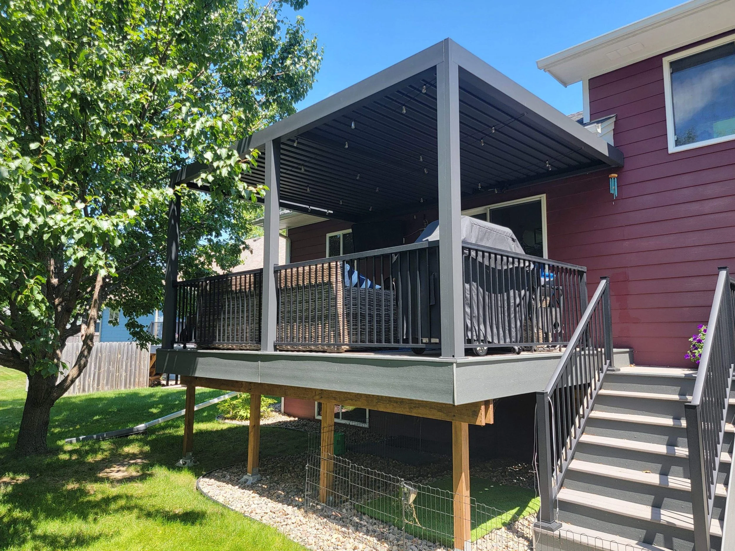 trex composite deck with composite fascia deck skirting and star black aluminum railing