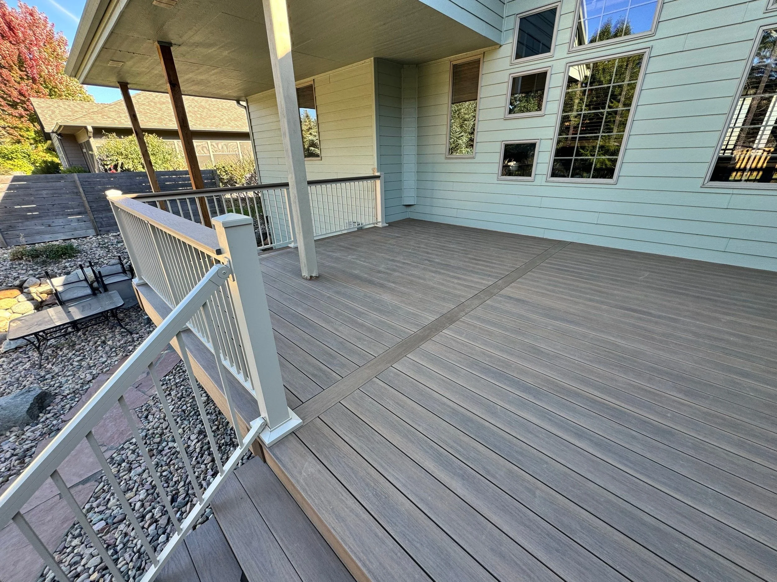 wolf pvc deck with star beige aluminum railing and integrated drink rail