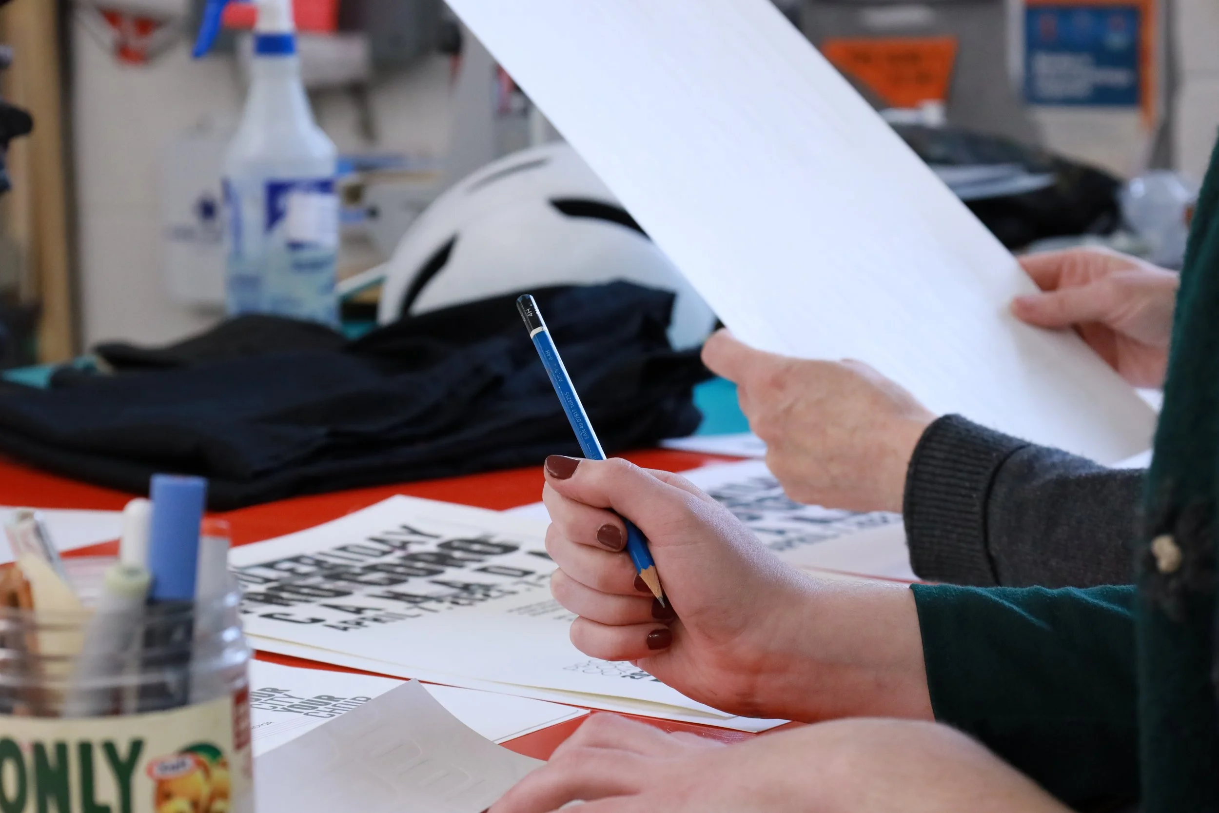 the colour blocks on the posters are printed digitally ahead of time.