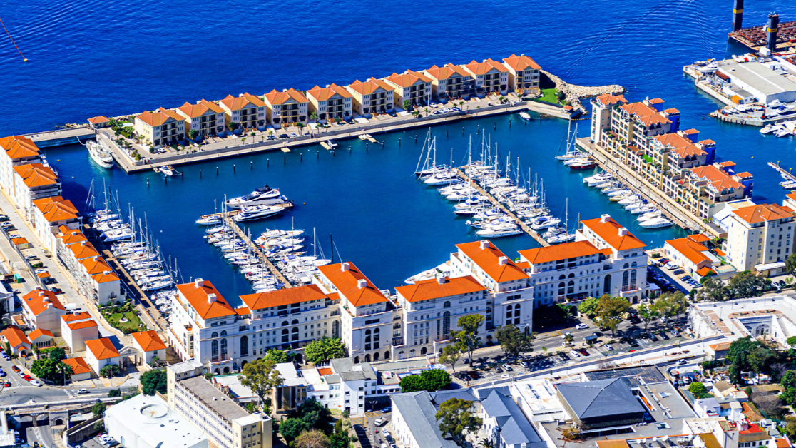 aerial view captures Queensway Quay Marina, a prominent marina and residential development located on the western side of Gibraltar